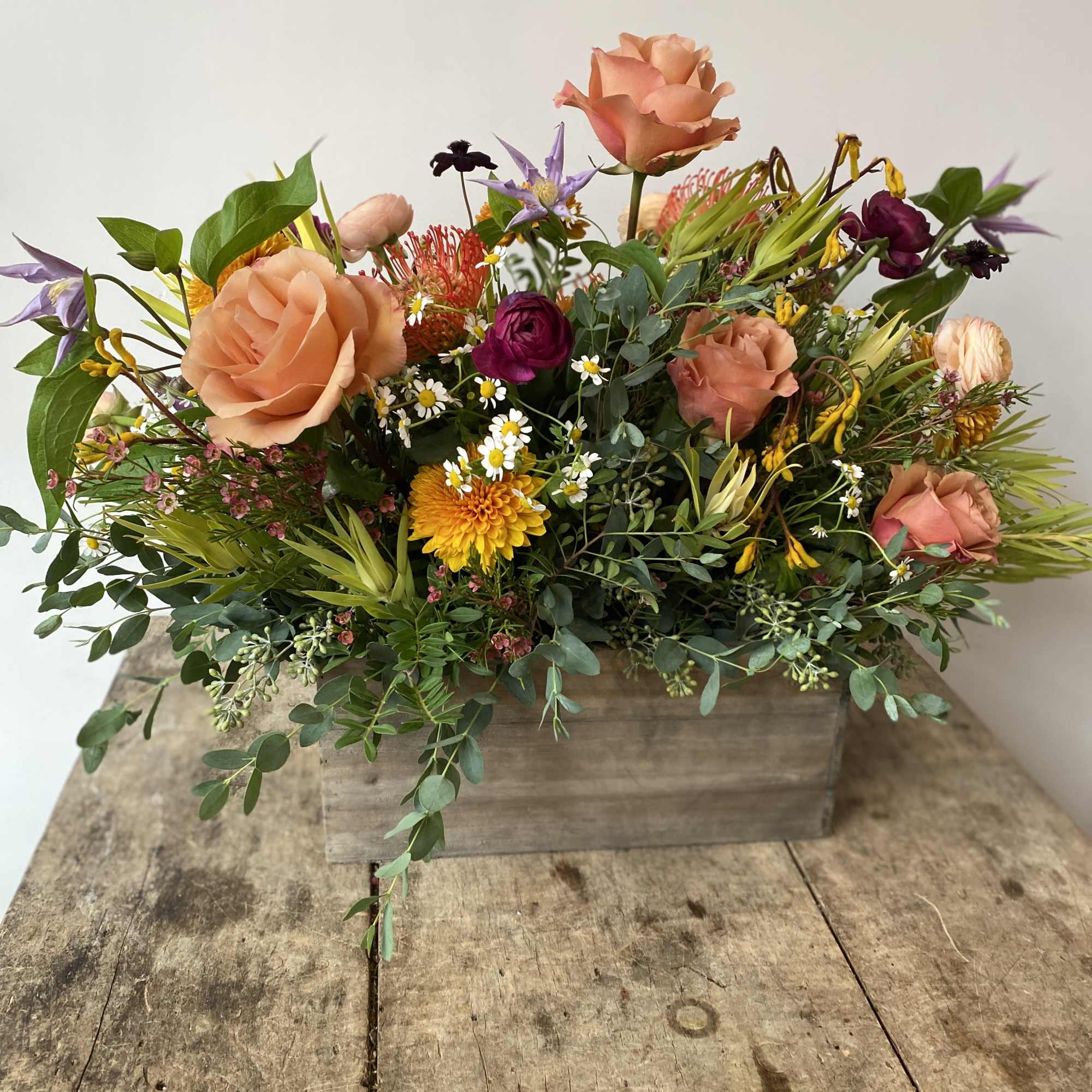 Looking for a gorgeous centerpiece for your Thanksgiving celebration? Our talented designers