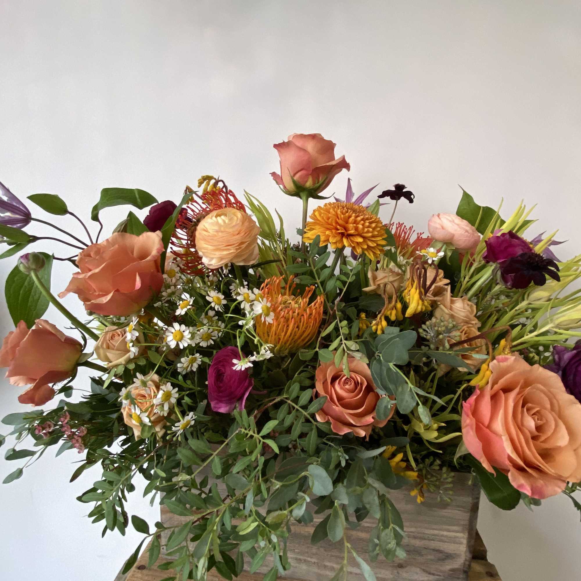 Looking for a gorgeous centerpiece for your Thanksgiving celebration? Our talented designers