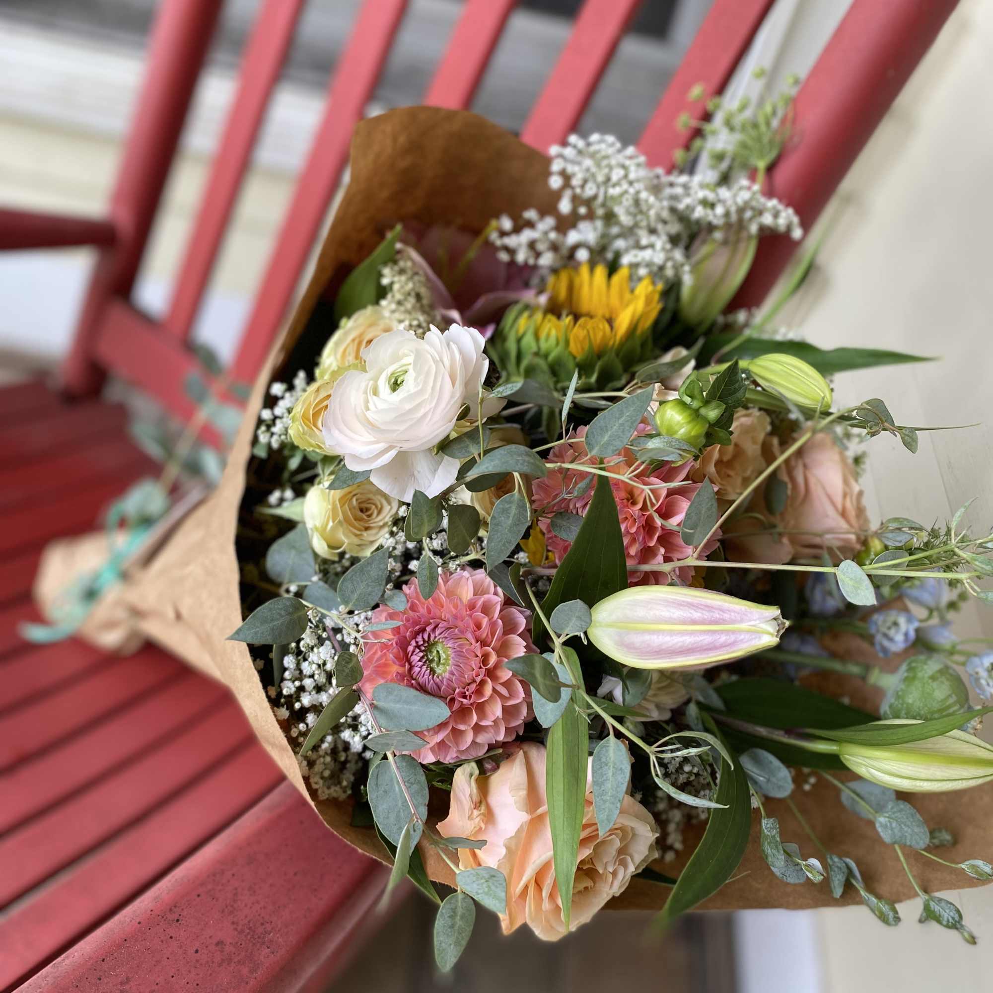 An abundant, hand-tied bouquet &mdash; gathered with whatever is most beautiful in