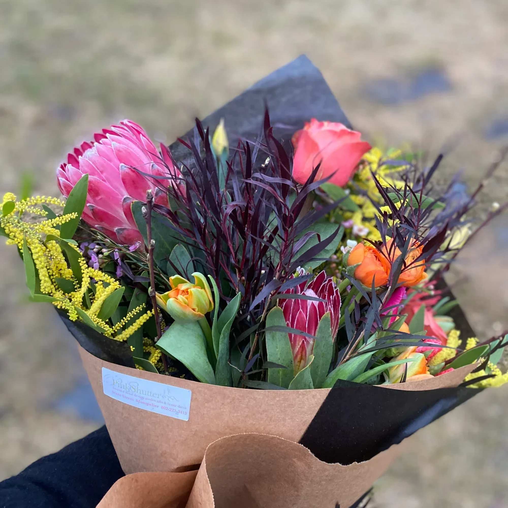 An abundant, hand-tied bouquet &mdash; gathered with whatever is most beautiful in