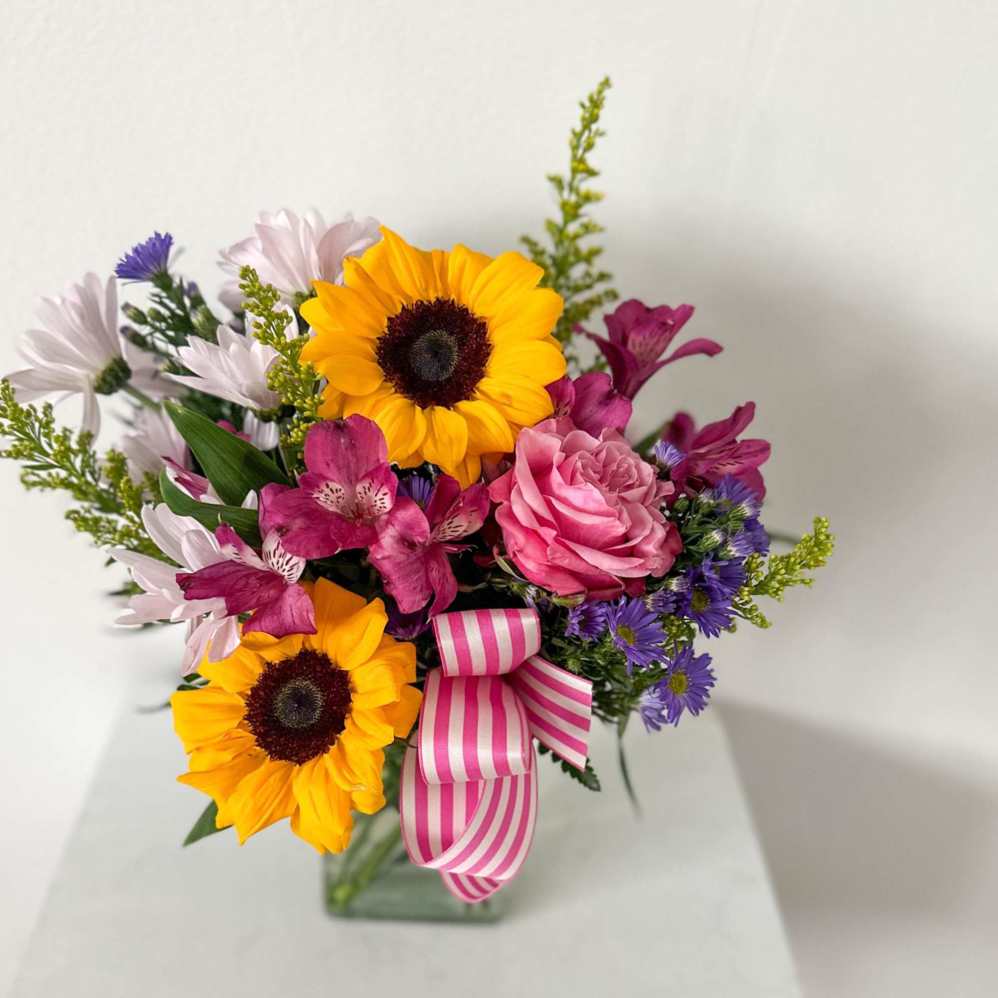 Sunny Day includes sunflowers, alstroemeria, daisies, and more! 
May need to substitute Sunny Day includes sunflowers, alstroemeria, daisies, and more! 
May need to substitute