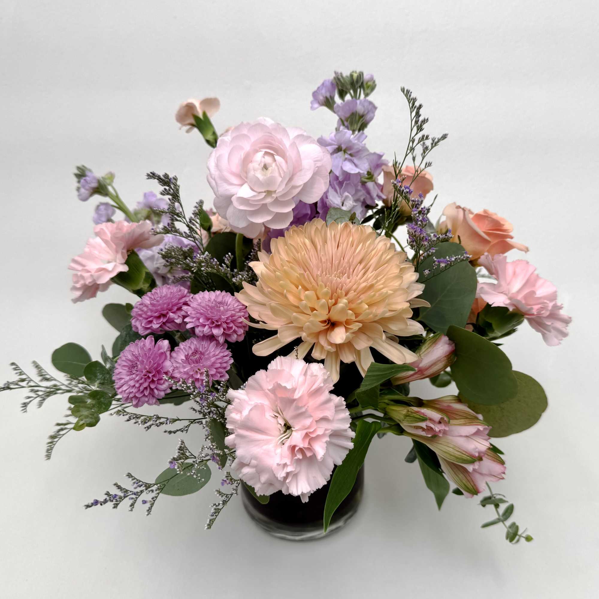 Delightfully enchanting is our Fairy Castle arrangement! Soft pink, peach and purple