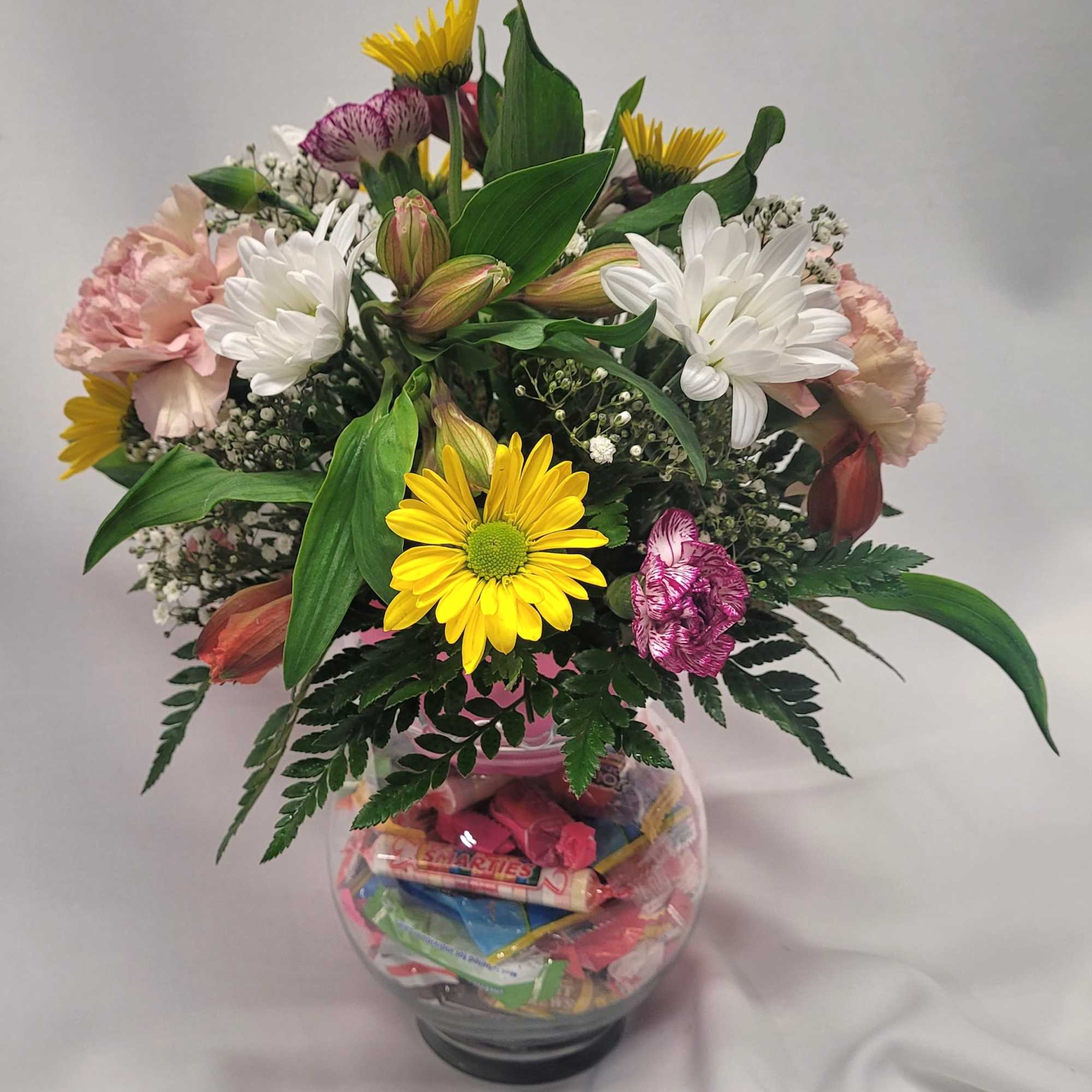 What makes this bowl of Mixed seasonal flowers so sweet? Inside the