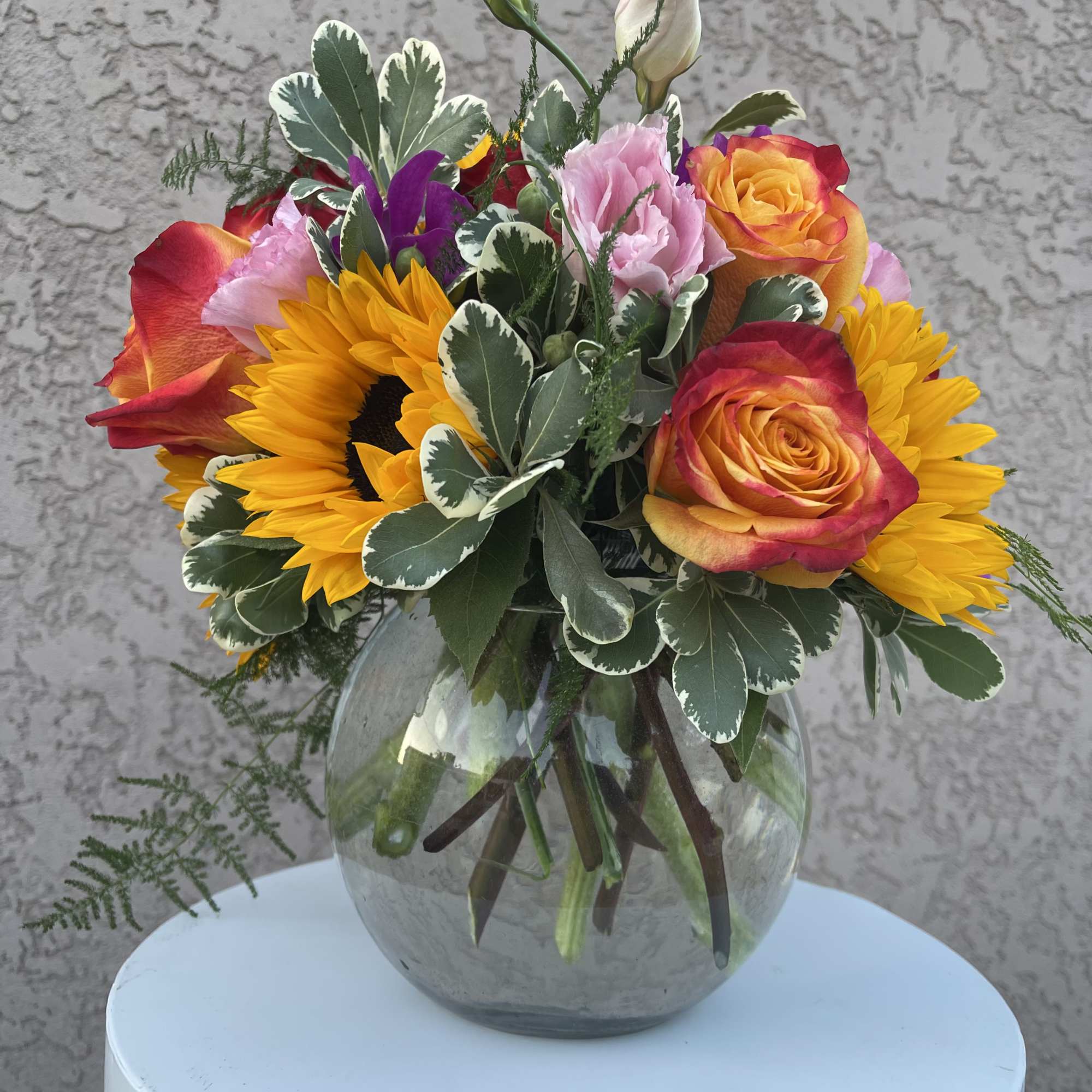 Brighten someone’s day with Golden Radiance, a stunning floral arrangement crafted in Brighten someone’s day with Golden Radiance, a stunning floral arrangement crafted in