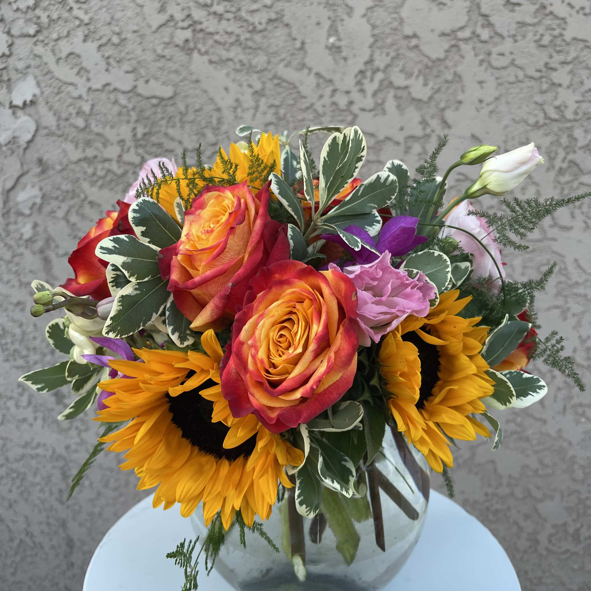Brighten someone’s day with Golden Radiance, a stunning floral arrangement crafted in Brighten someone’s day with Golden Radiance, a stunning floral arrangement crafted in