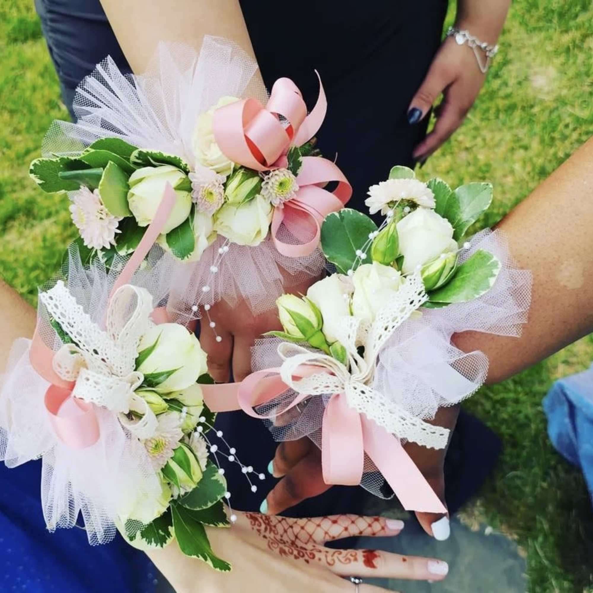 This Corsage &amp; Boutonniere set is customized with you chosen color .
red