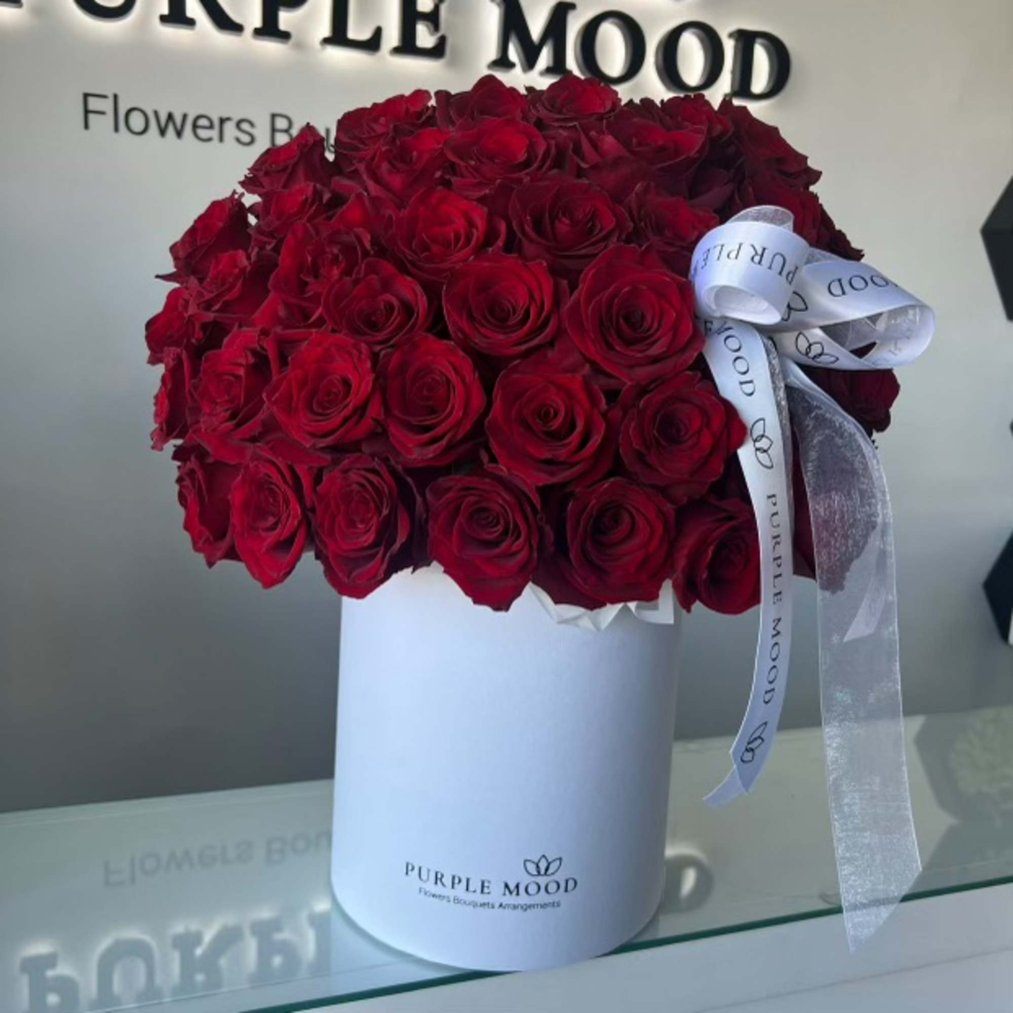 50 high-quality red roses in a box. Celebrate love and admiration with 50 high-quality red roses in a box. Celebrate love and admiration with