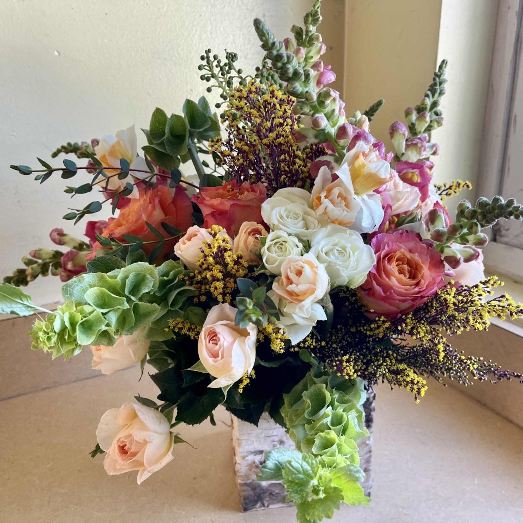 A beautiful combination of everything FALL! From fragrant roses, to bright beautiful