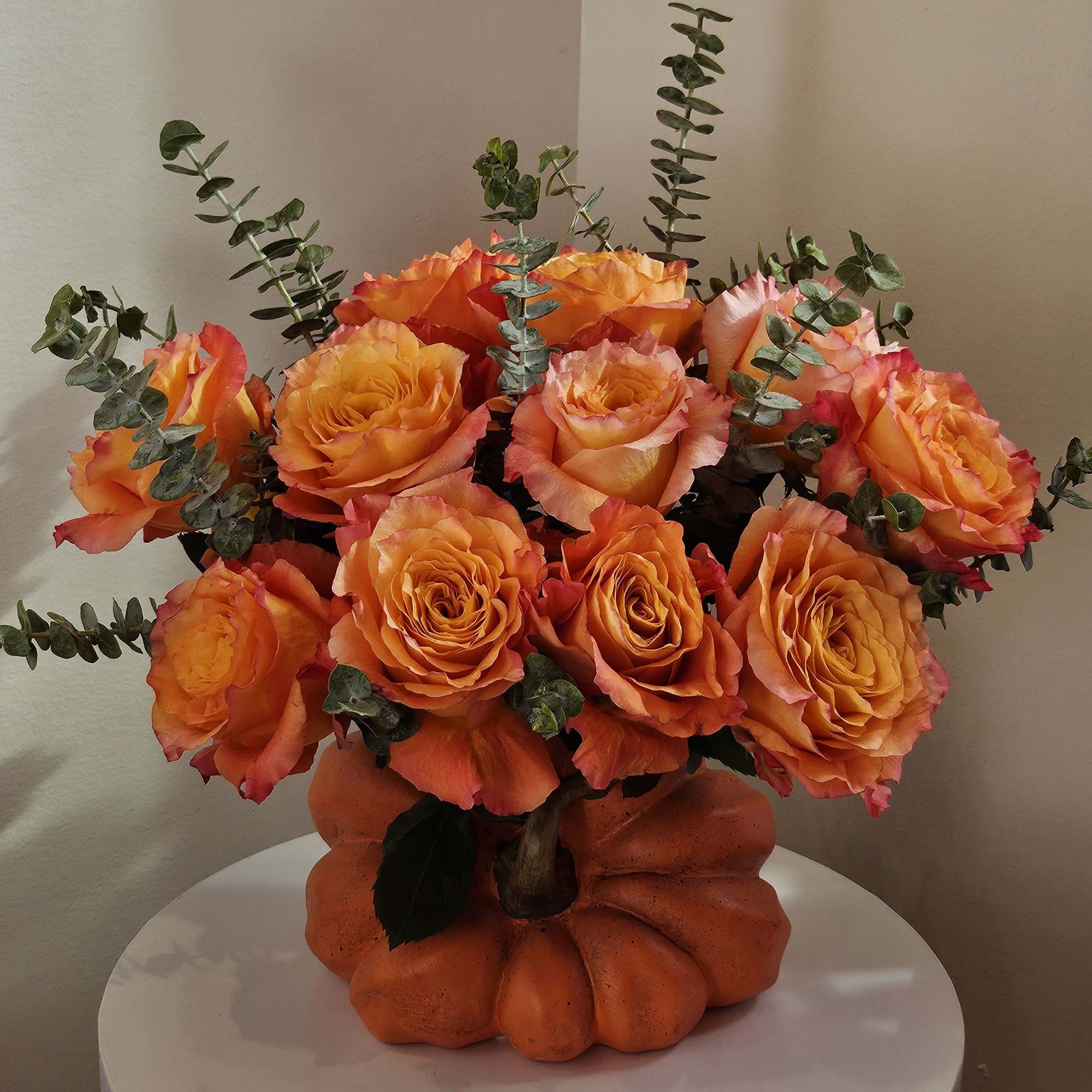 Chick roses -Free Spirit in a pumpkin vase. 