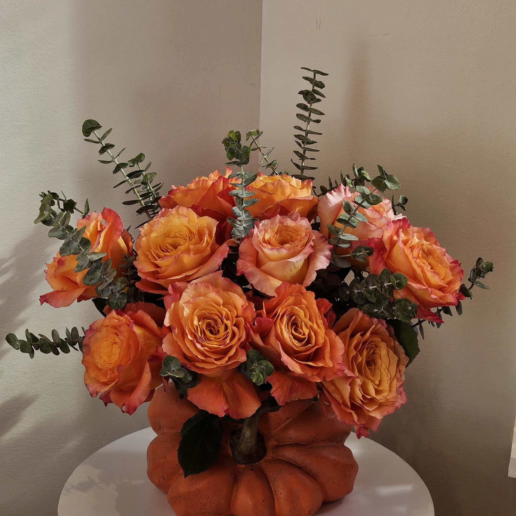 Chick roses -Free Spirit in a pumpkin vase. 