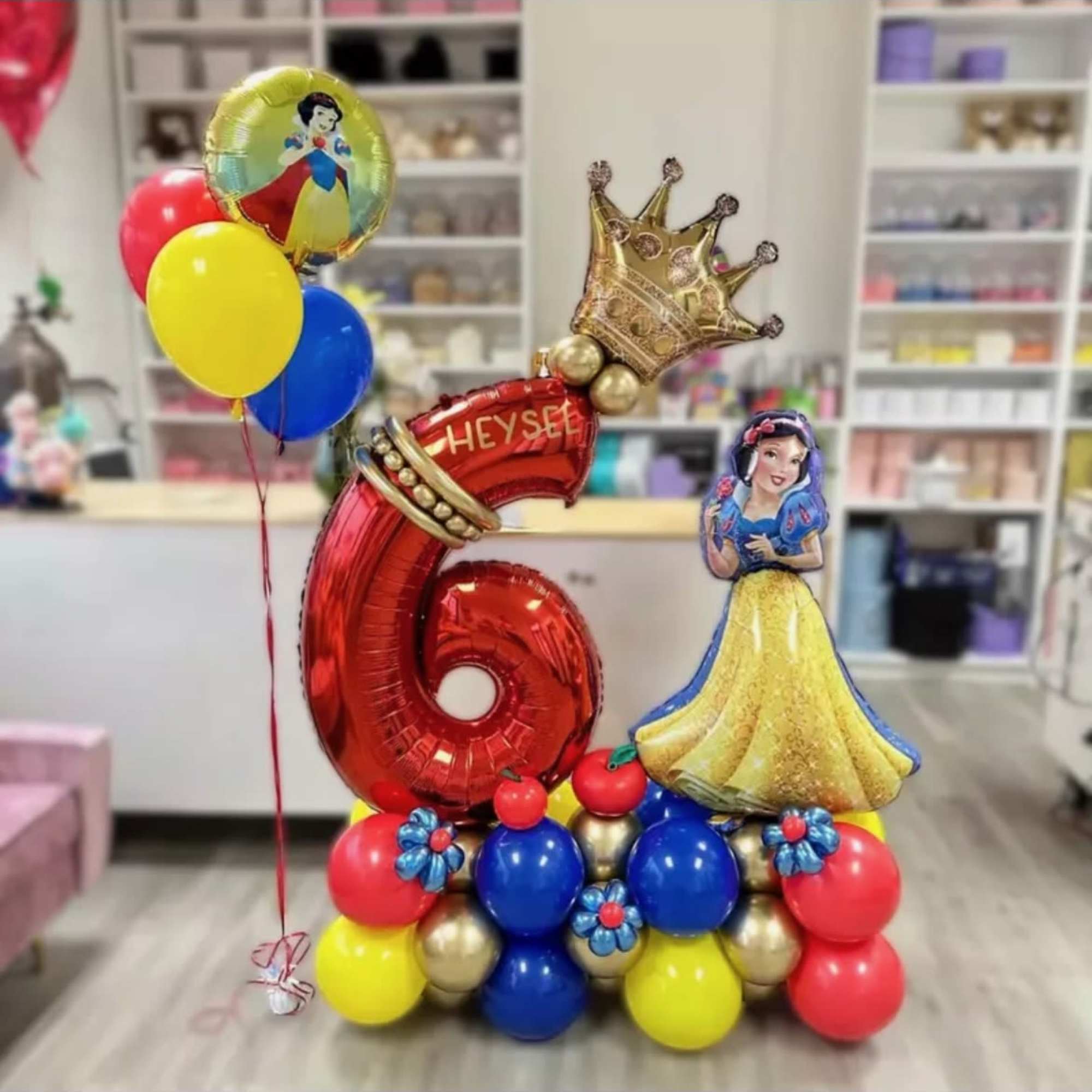 Our custom balloon arrangements featuring a single large number are perfect for