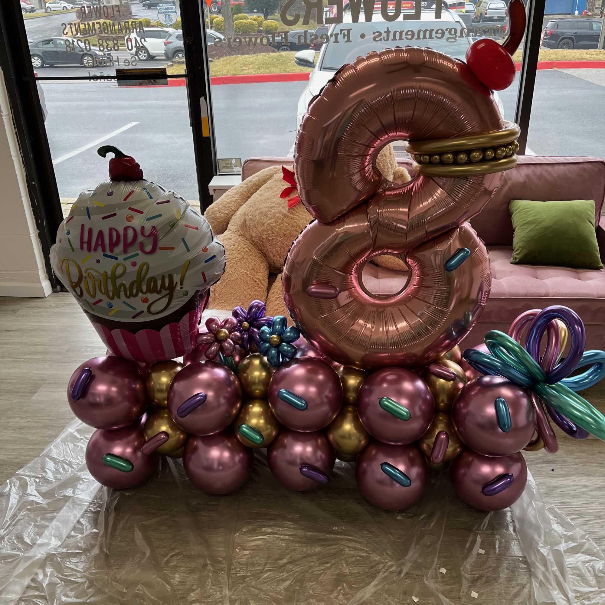 Our custom balloon arrangements featuring a single large number are perfect for