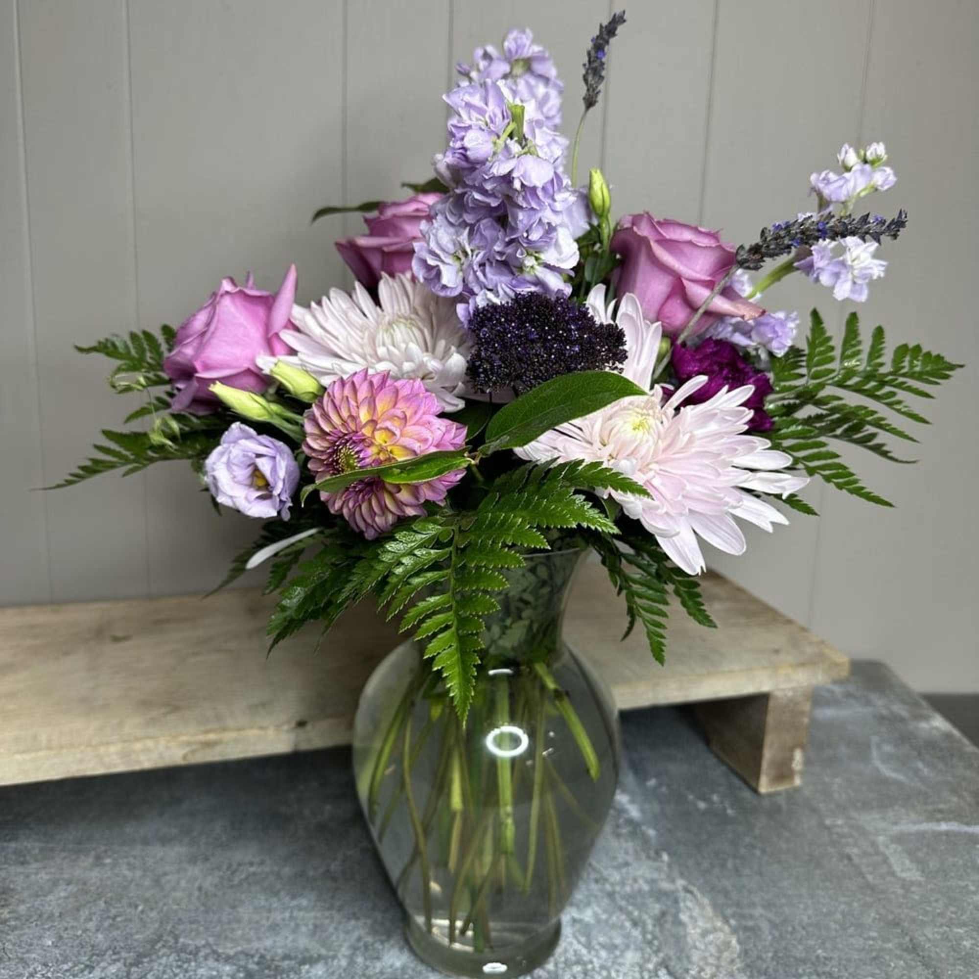 Elevate the art of personalization with our Monochromatic Medley. This unique floral