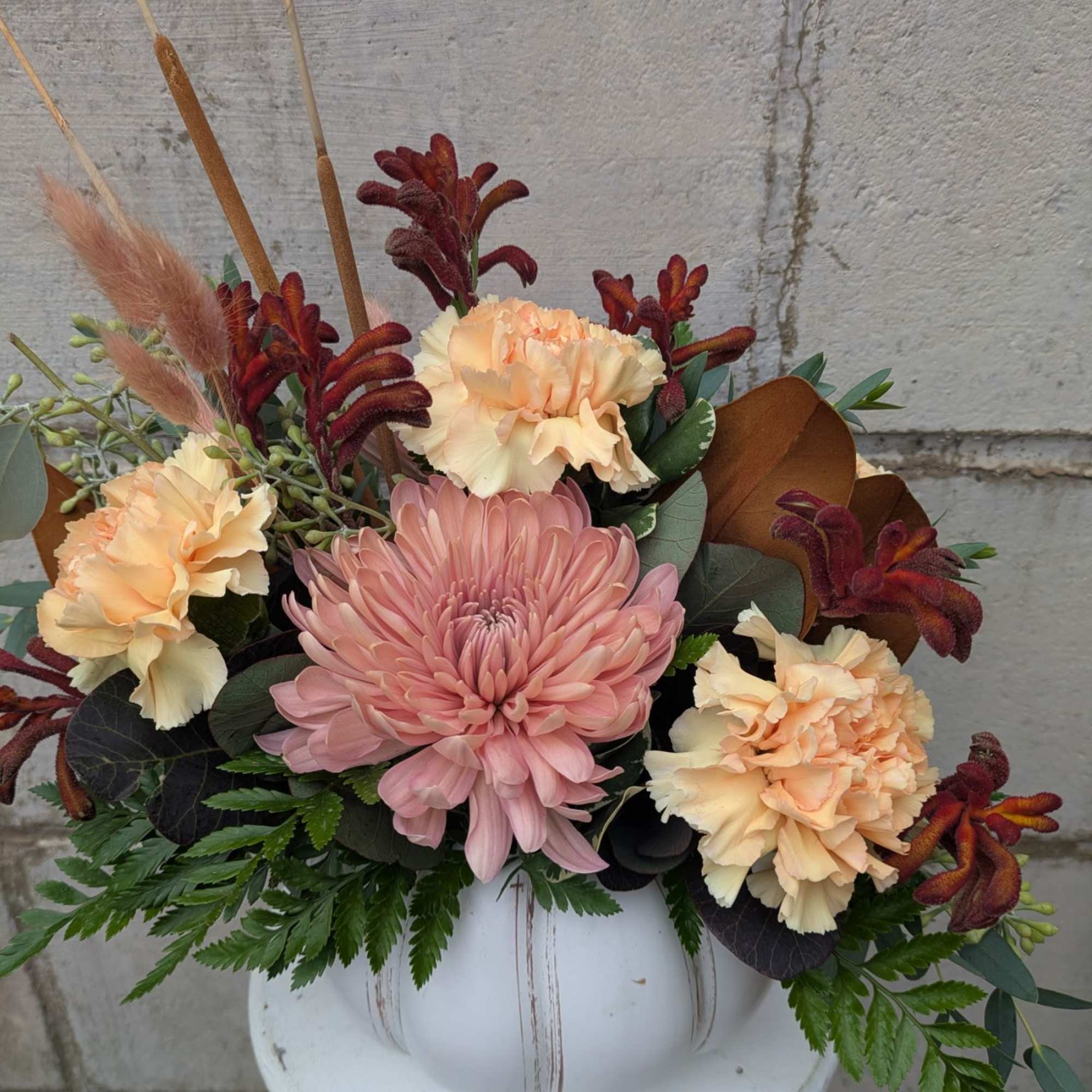 A graceful ode to autumn&rsquo;s most romantic hues, Cattails &amp; Crimson blends