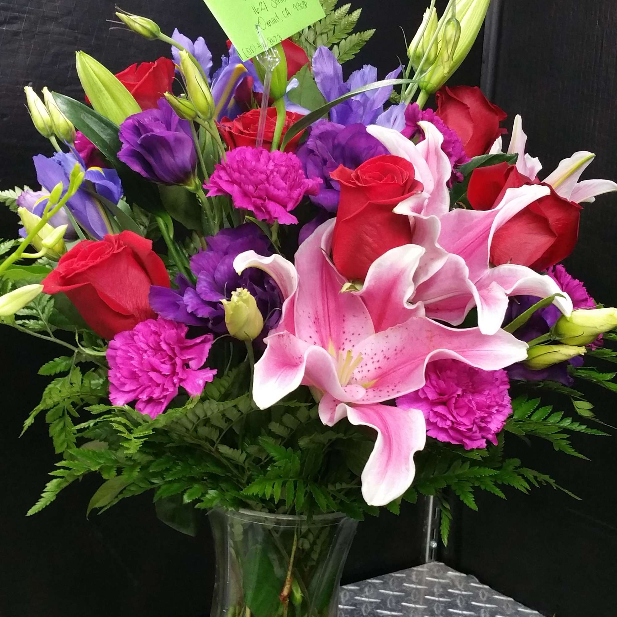 roses and lilies mix in a vase 