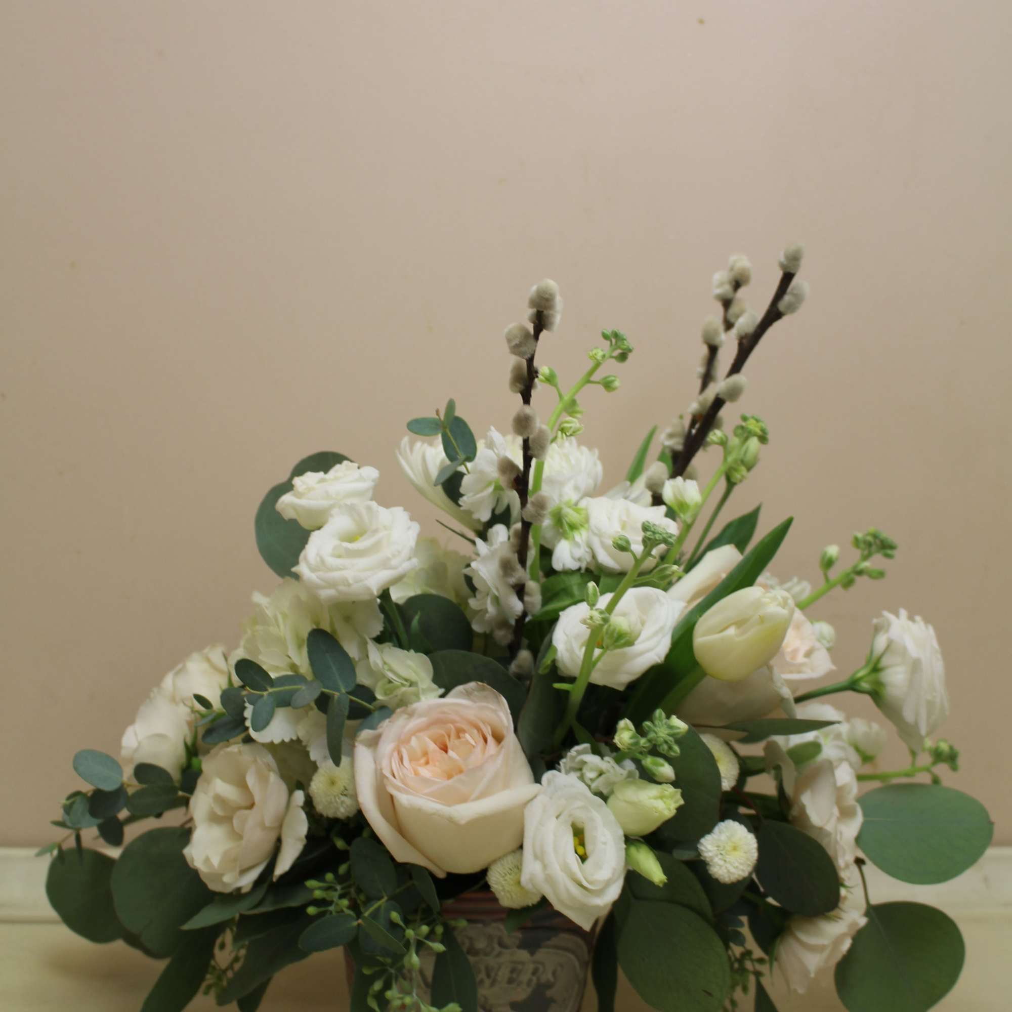 Soft spring has arrived, pussy willow, roses and tulips fill this distressed