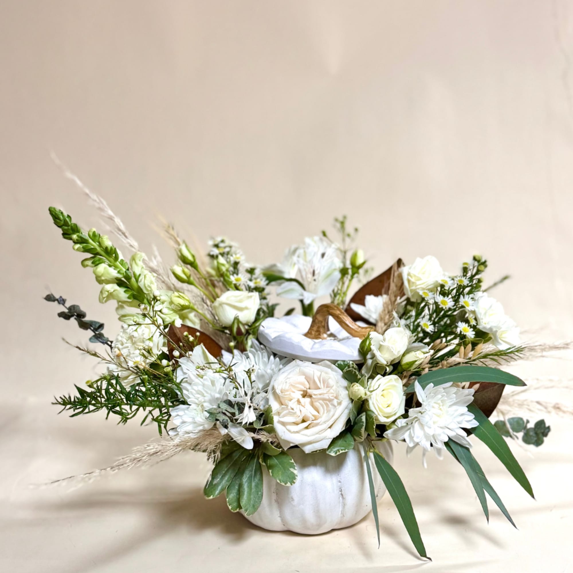 Our Pumpkin Spice Arrangement brings the warm colors of fall to life Our Pumpkin Spice Arrangement brings the warm colors of fall to life