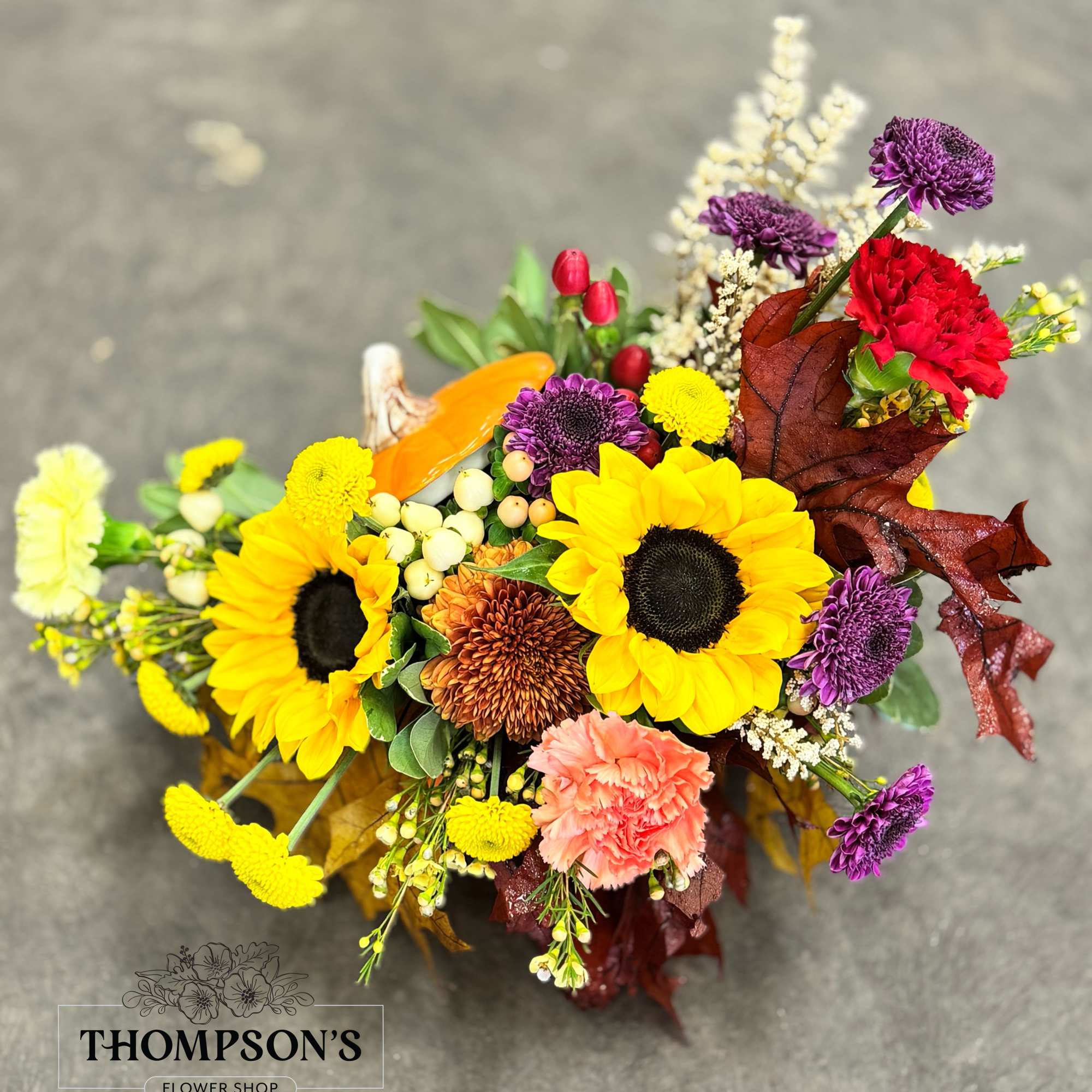 Celebrate the bounty of the season with the Harvest Pumpkin arrangement. Bursting Celebrate the bounty of the season with the Harvest Pumpkin arrangement. Bursting