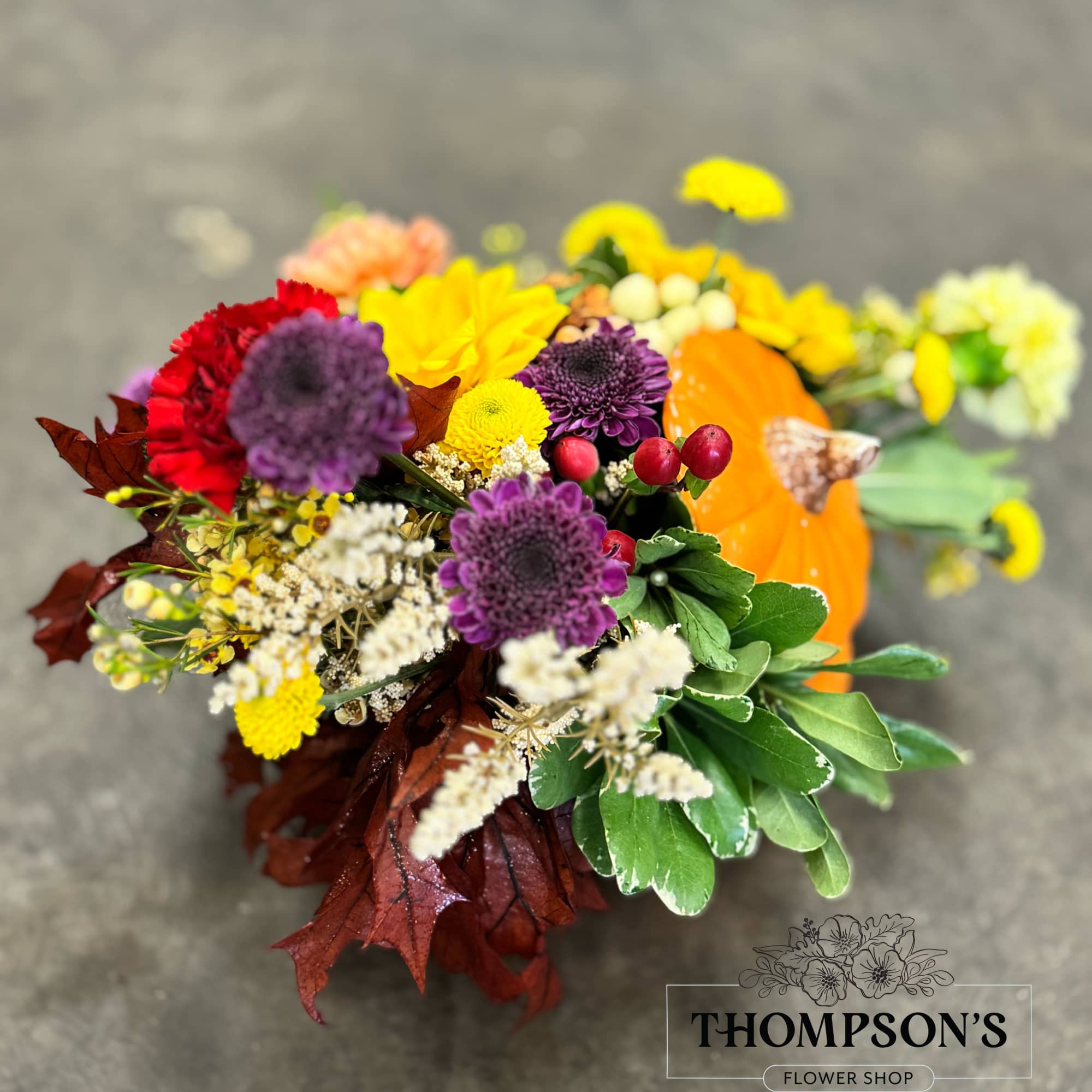 Celebrate the bounty of the season with the Harvest Pumpkin arrangement. Bursting Celebrate the bounty of the season with the Harvest Pumpkin arrangement. Bursting