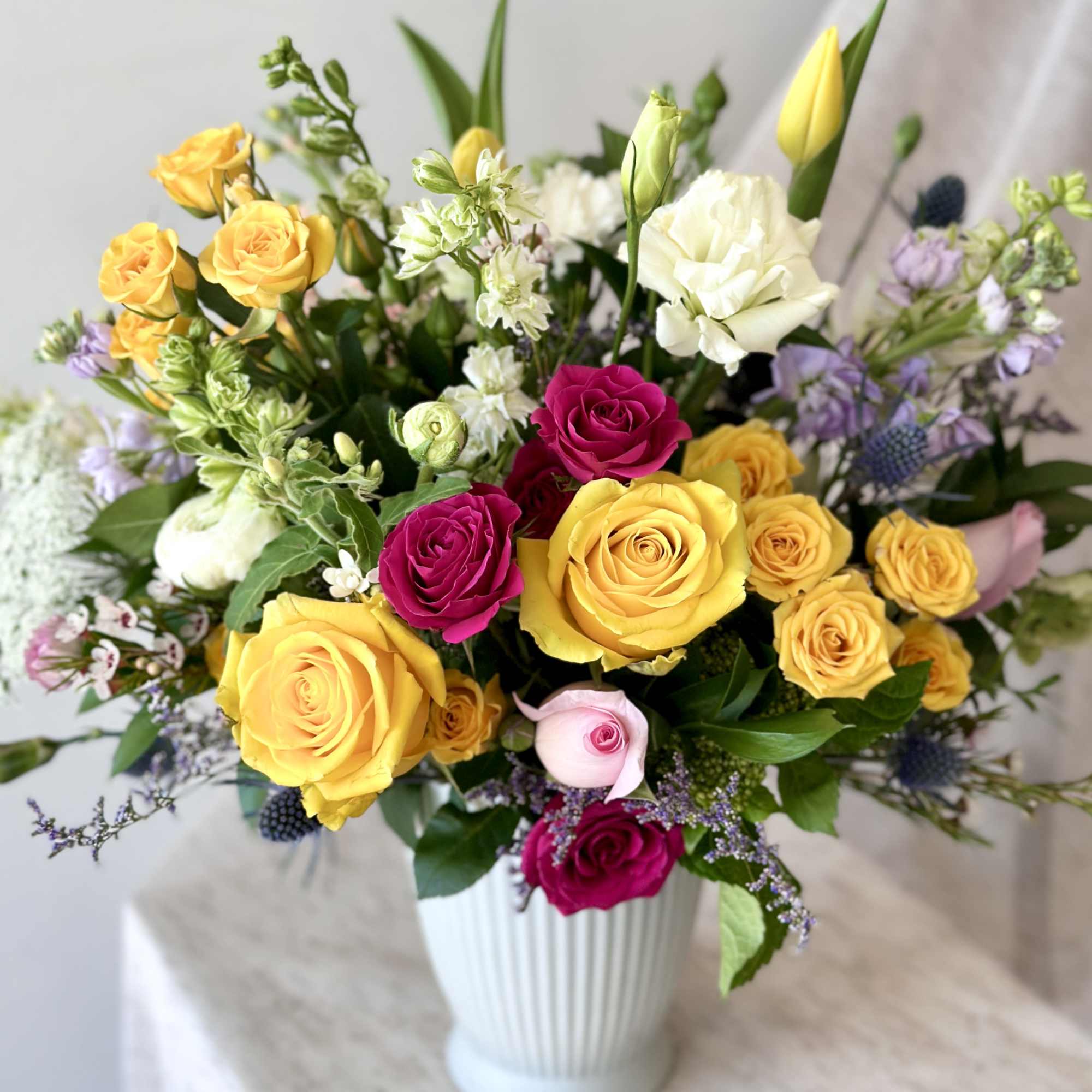 Mixed florist choice of flowers in a pot to make someone&#039;s day