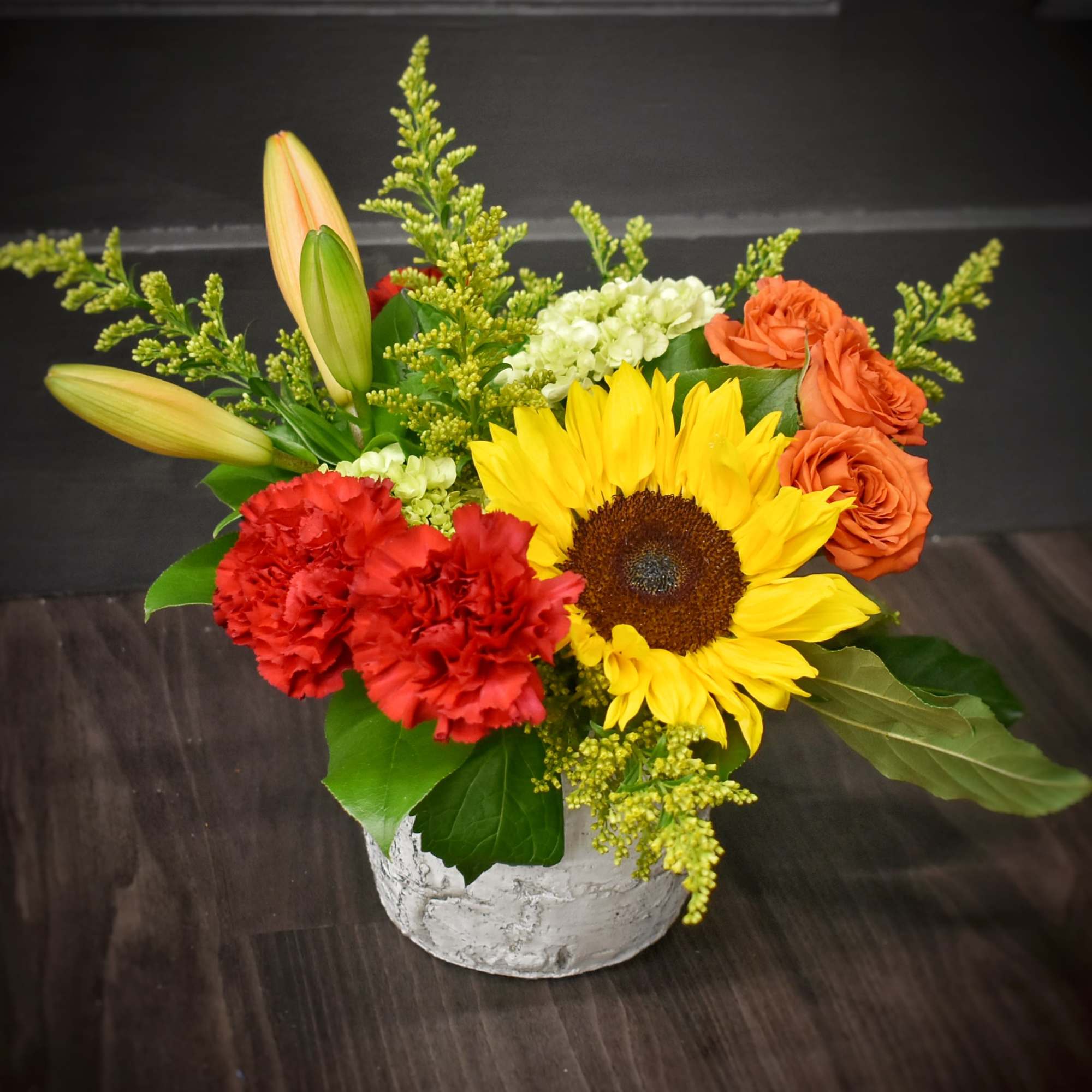 Channel summer into fall with this sunny arrangement. Featuring all of the Channel summer into fall with this sunny arrangement. Featuring all of the