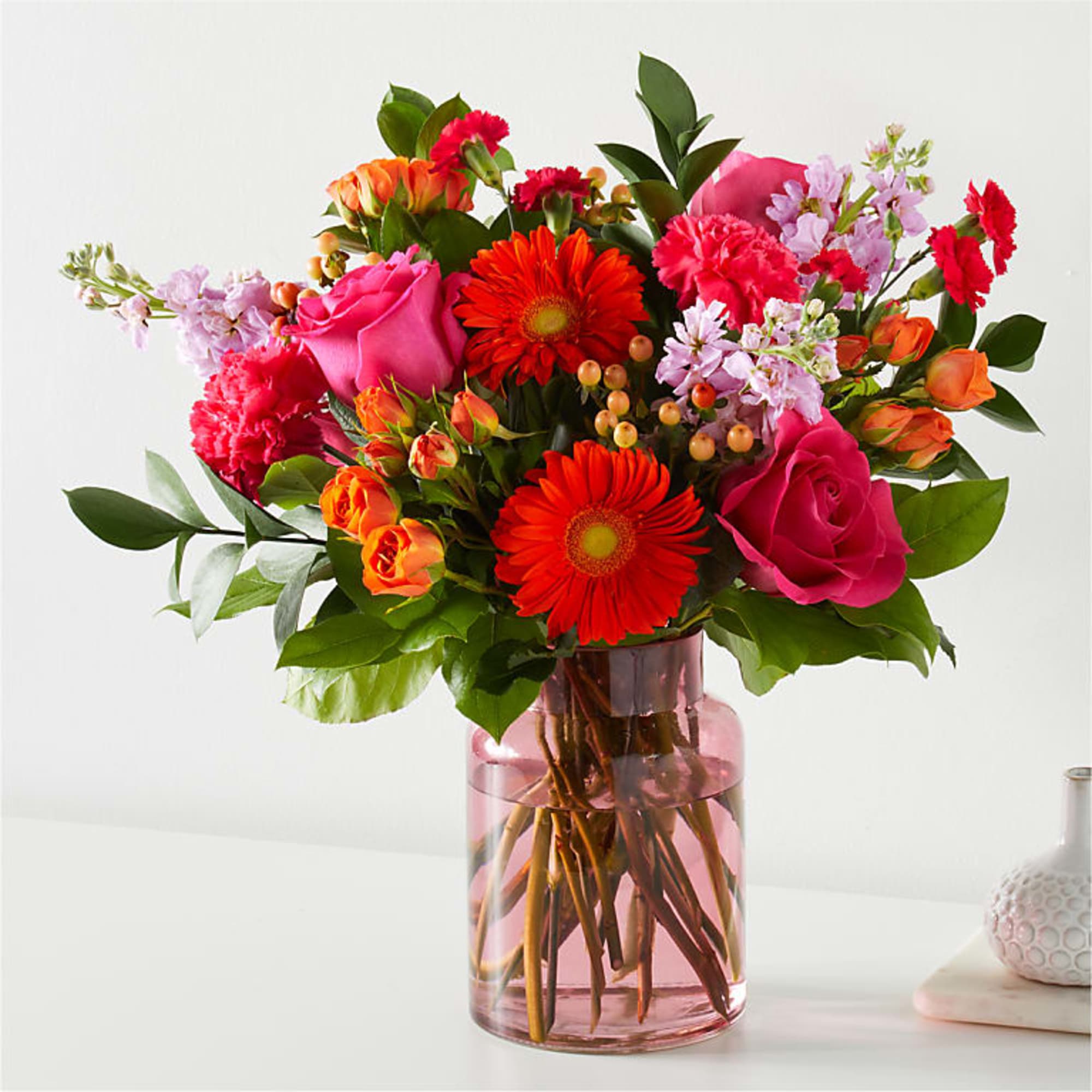 The Fiesta Bouquet is composed of a lively mix, fit to celebrate The Fiesta Bouquet is composed of a lively mix, fit to celebrate