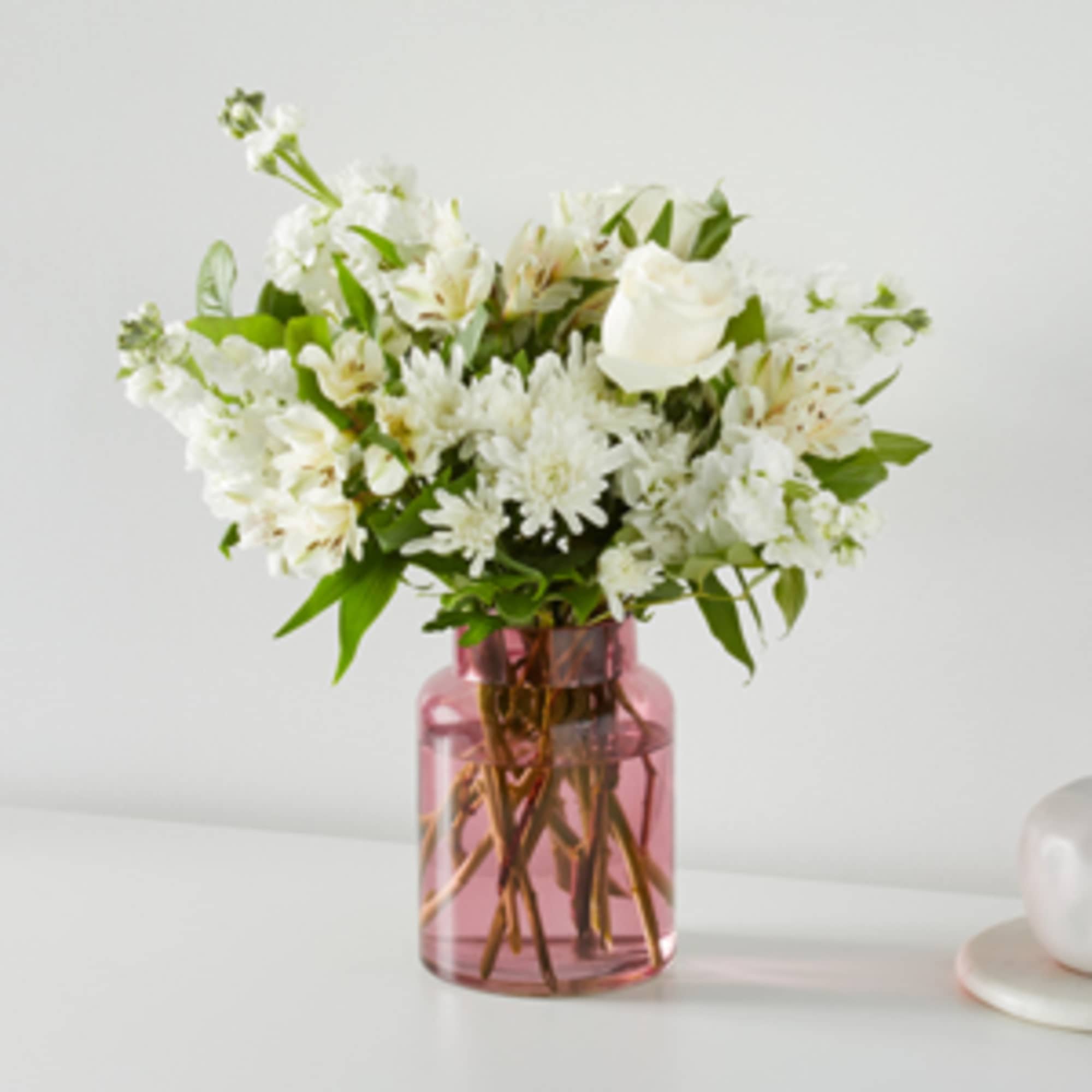 Share how much you care with an abundance of elegant white florals.