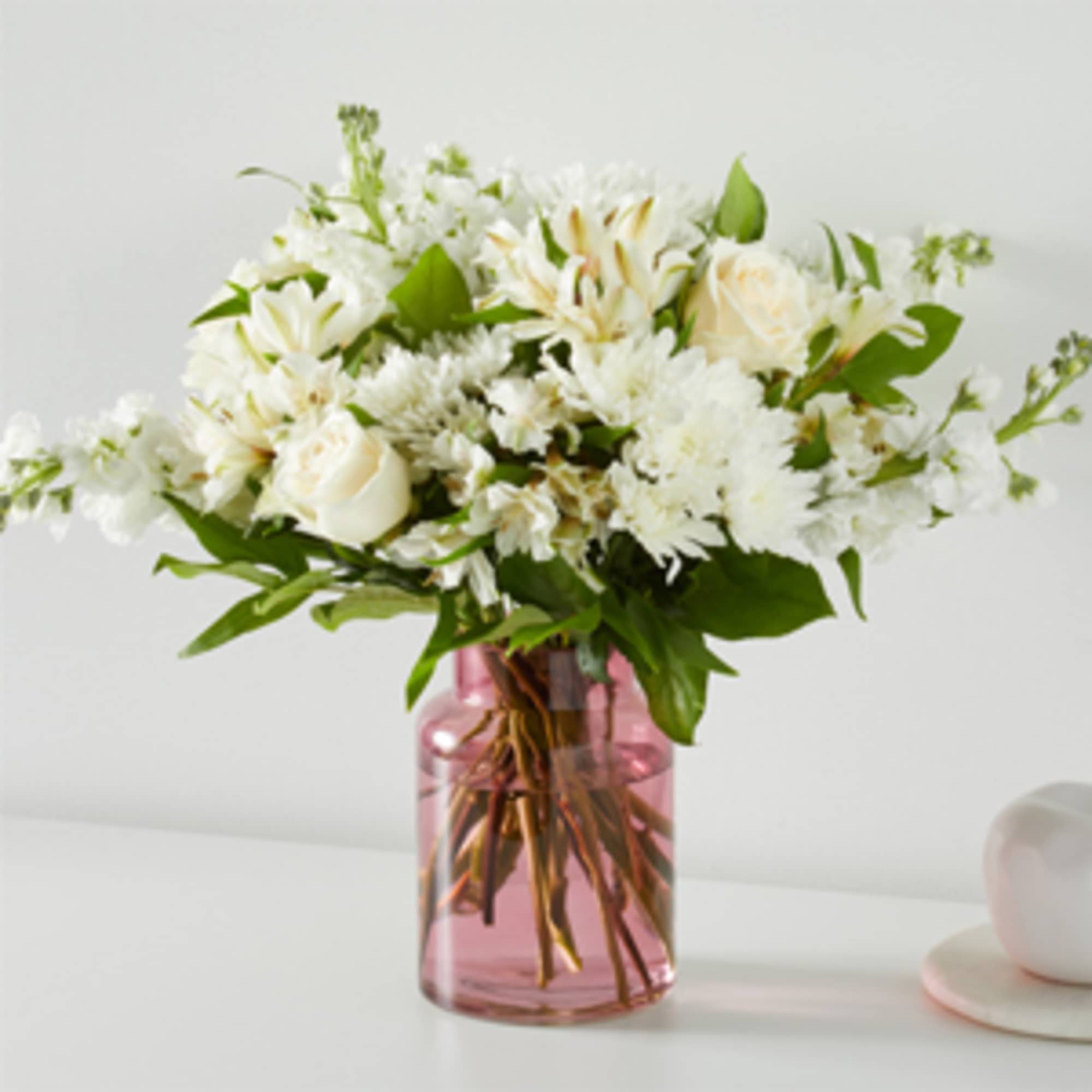 Share how much you care with an abundance of elegant white florals.