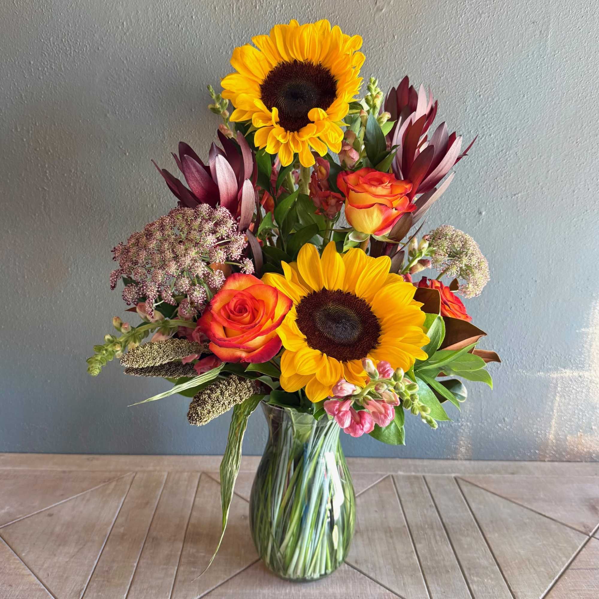 Have someone singing your praises when they receive this beautiful arrangement featuring