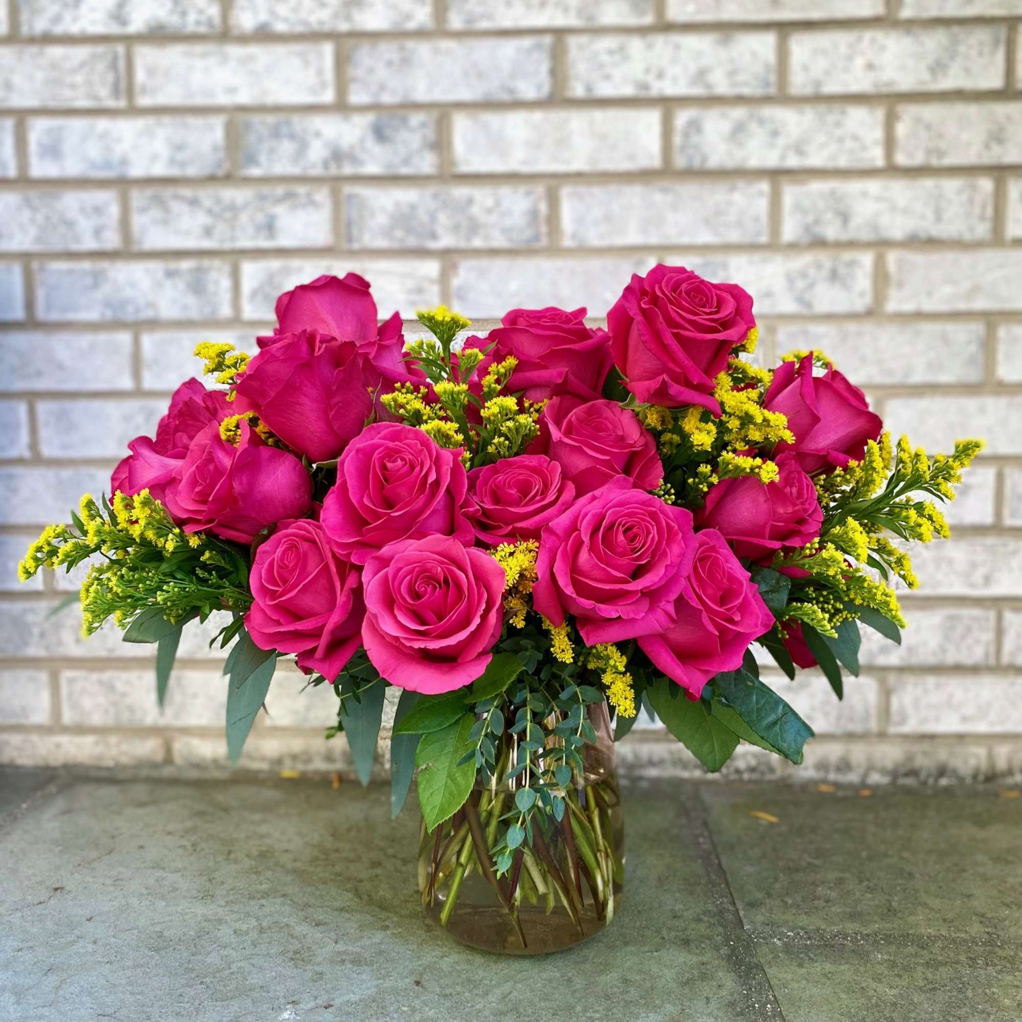 Gorgeous pink rose arrangement (Standard: 18, Deluxe: 24, Premium: 36) accented with