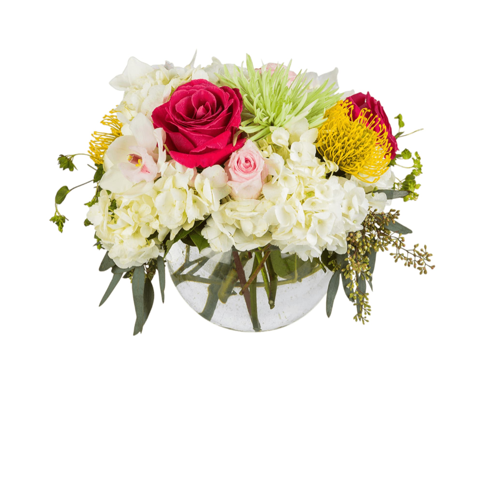 This arrangement includes cymbidium orchids, protea, hydrangea, roses, and other seasonal blooms.