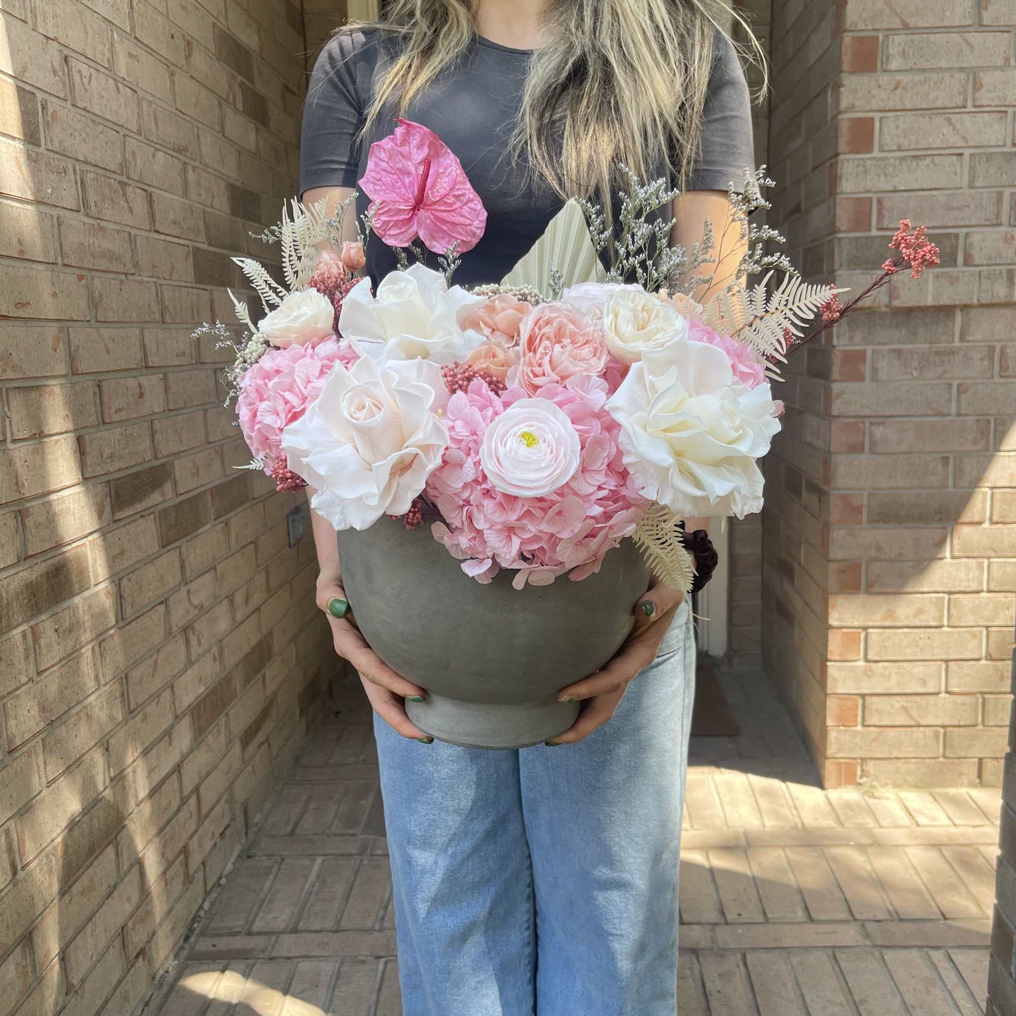 Romantic design is a vibrant bouquet of preserved garden roses, roses,hydrangeas, anthurium