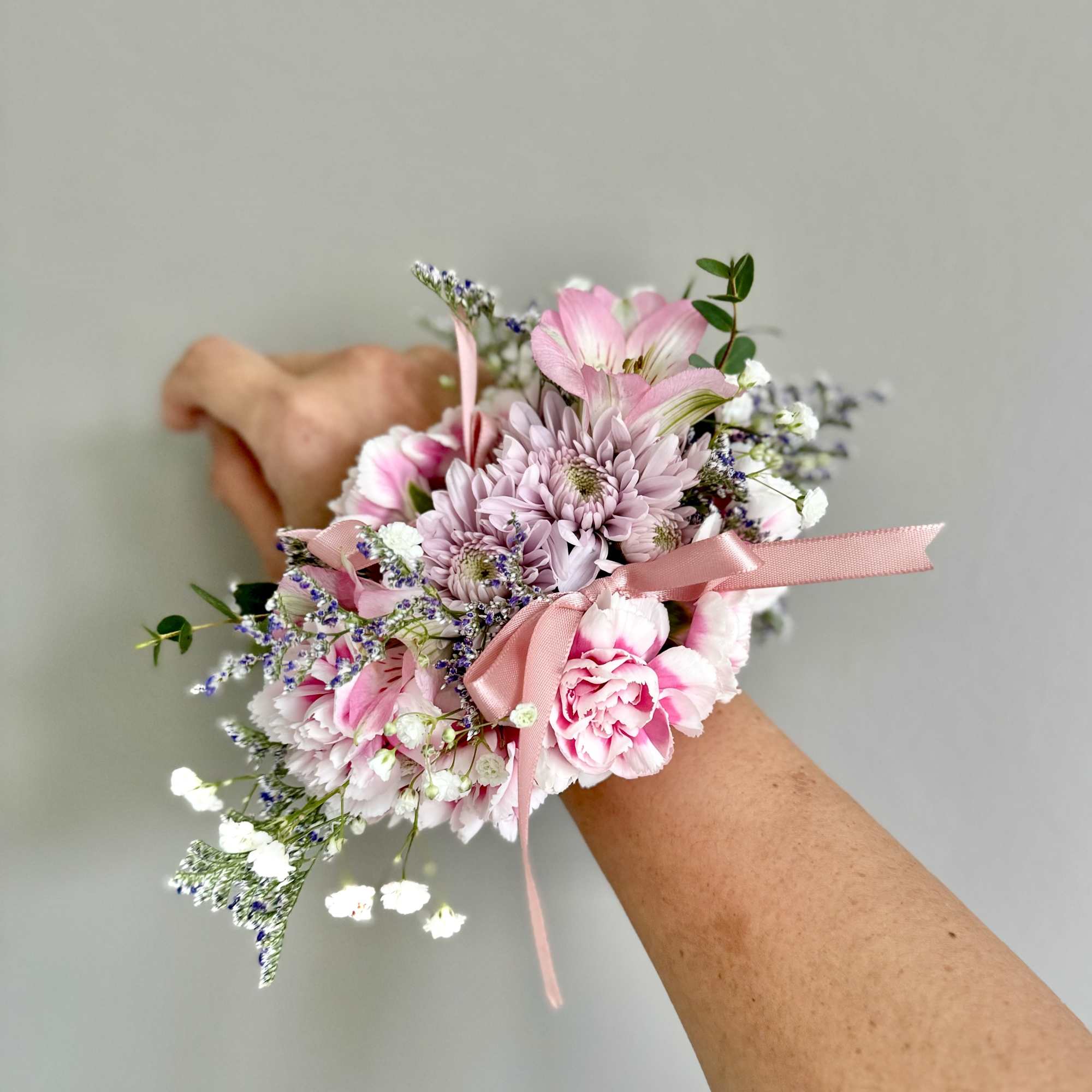 A youthful and elegant design especially created by the Florist. Flowers are