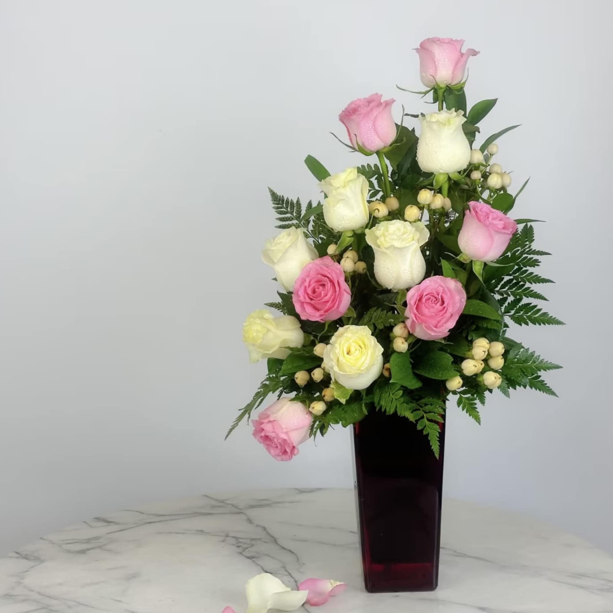 A dozen roses elegantly designed with a contemporary flare! Great for birthdays