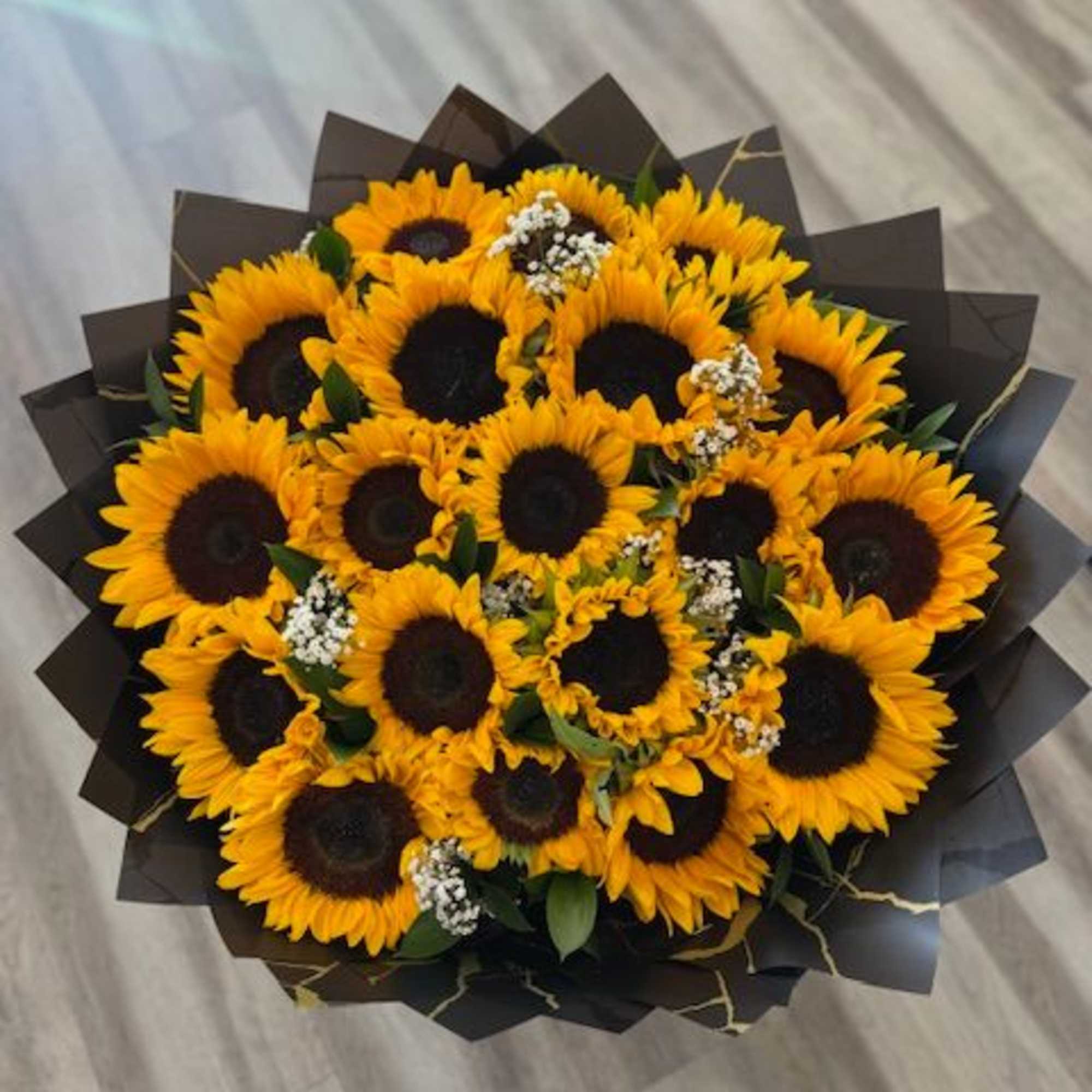 20 sunflowers with greens and baby&#039;s breath 