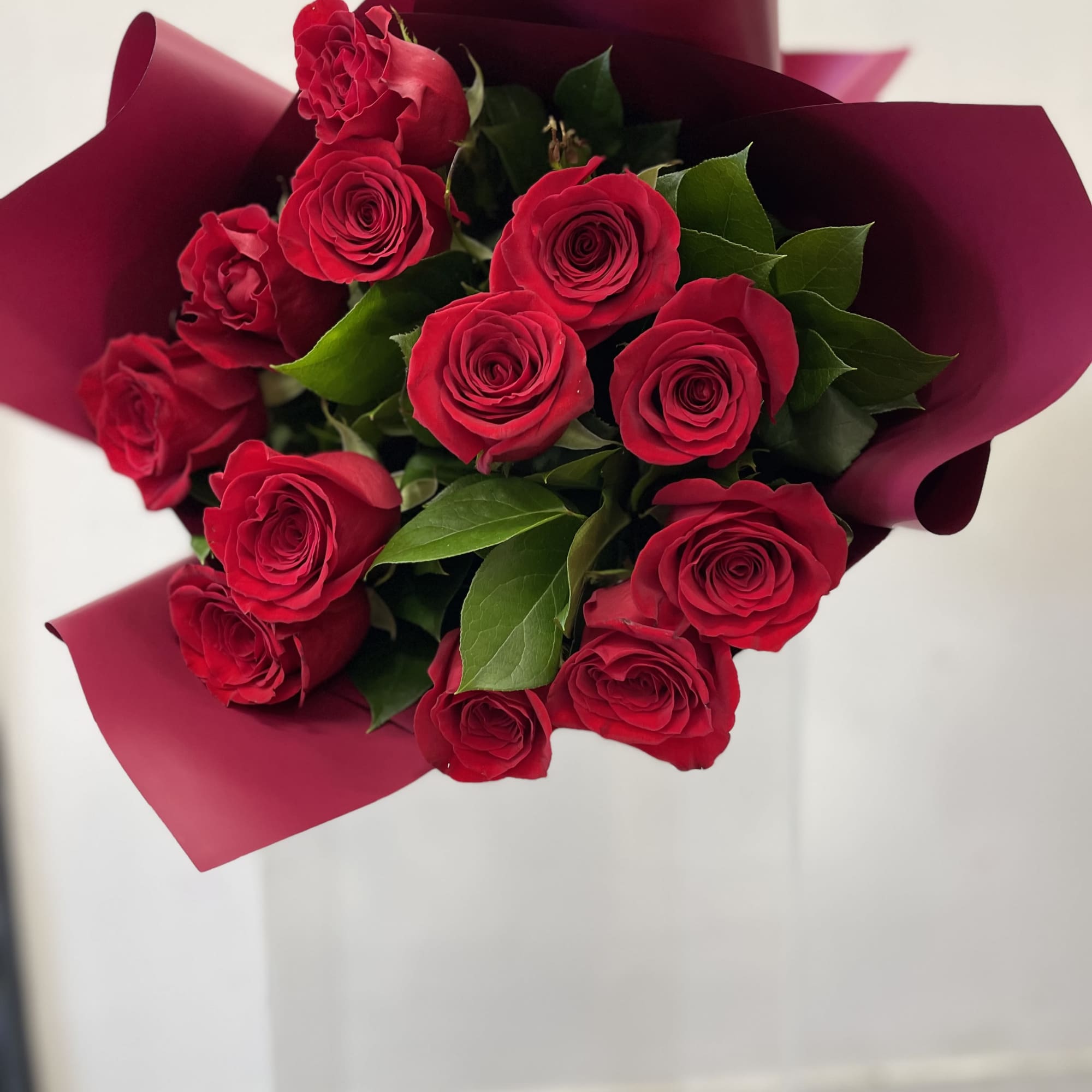 Petit Boquet of Red Roses wrapped for that special person. Great for