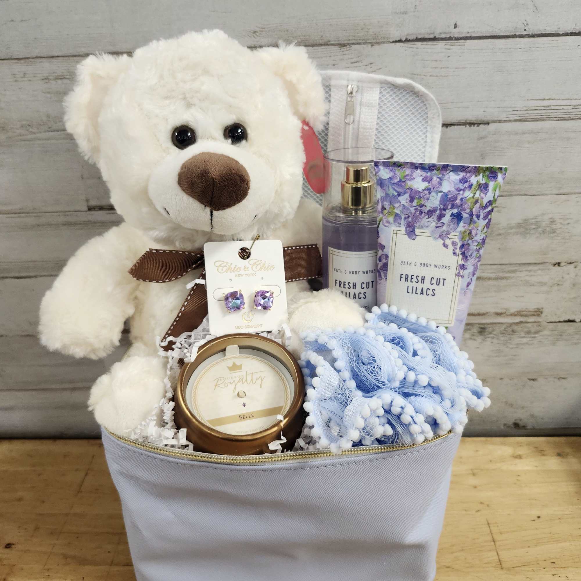 A cute, curated basket prefect for any occasion containing:

- Plush Teddy Bear
-