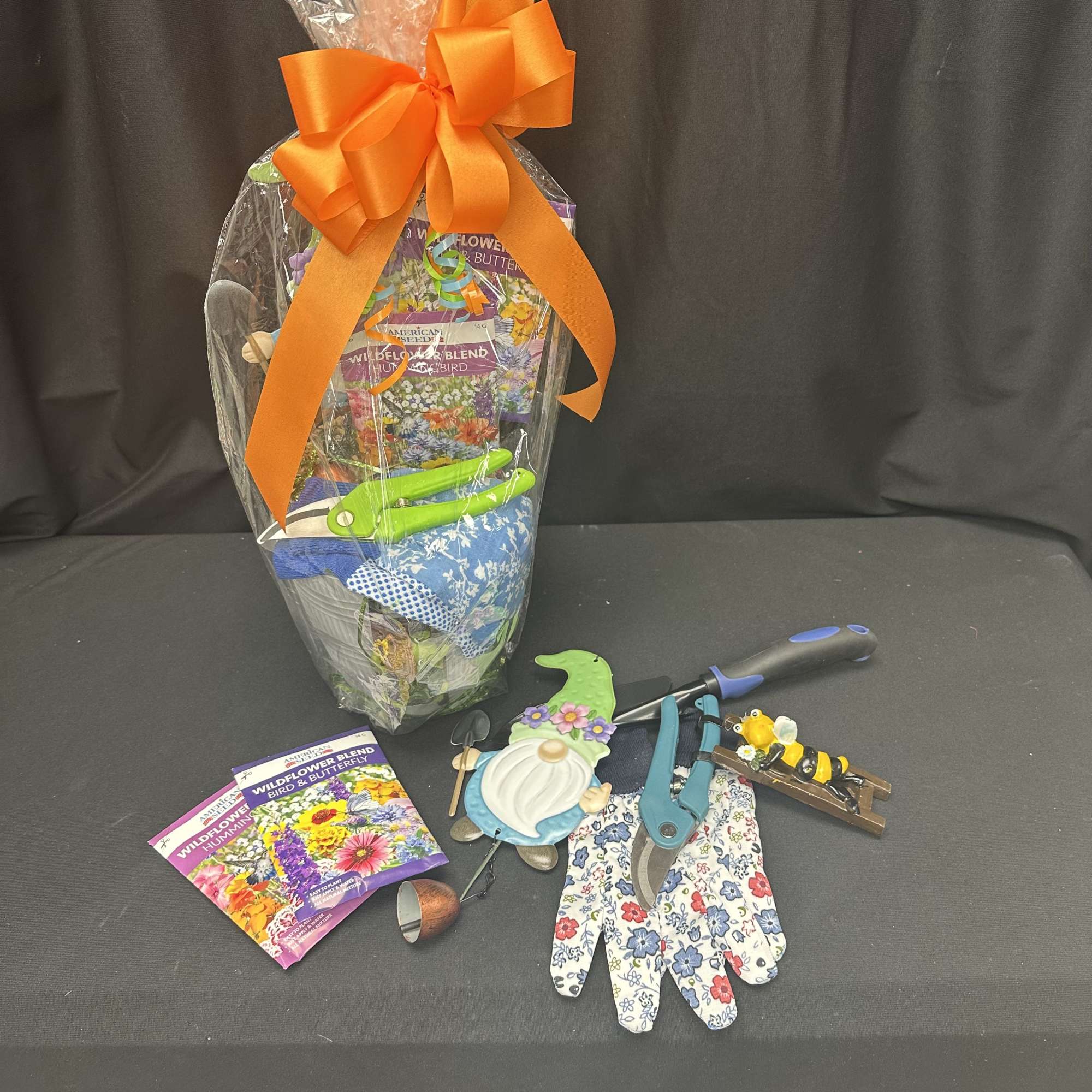 Bring joy to any green thumb with our Grow Happy Basket! Filled