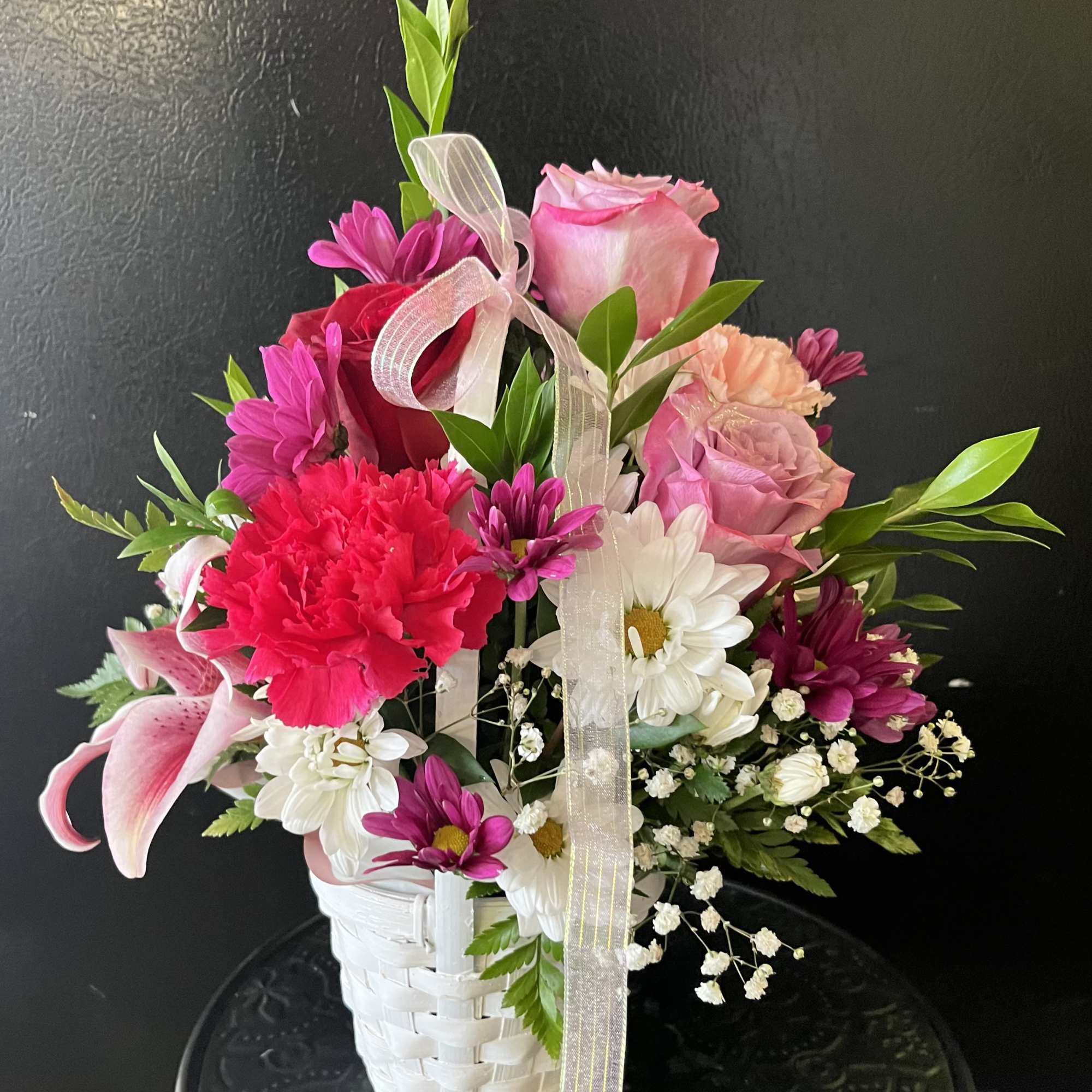 fresh flowers in basket 