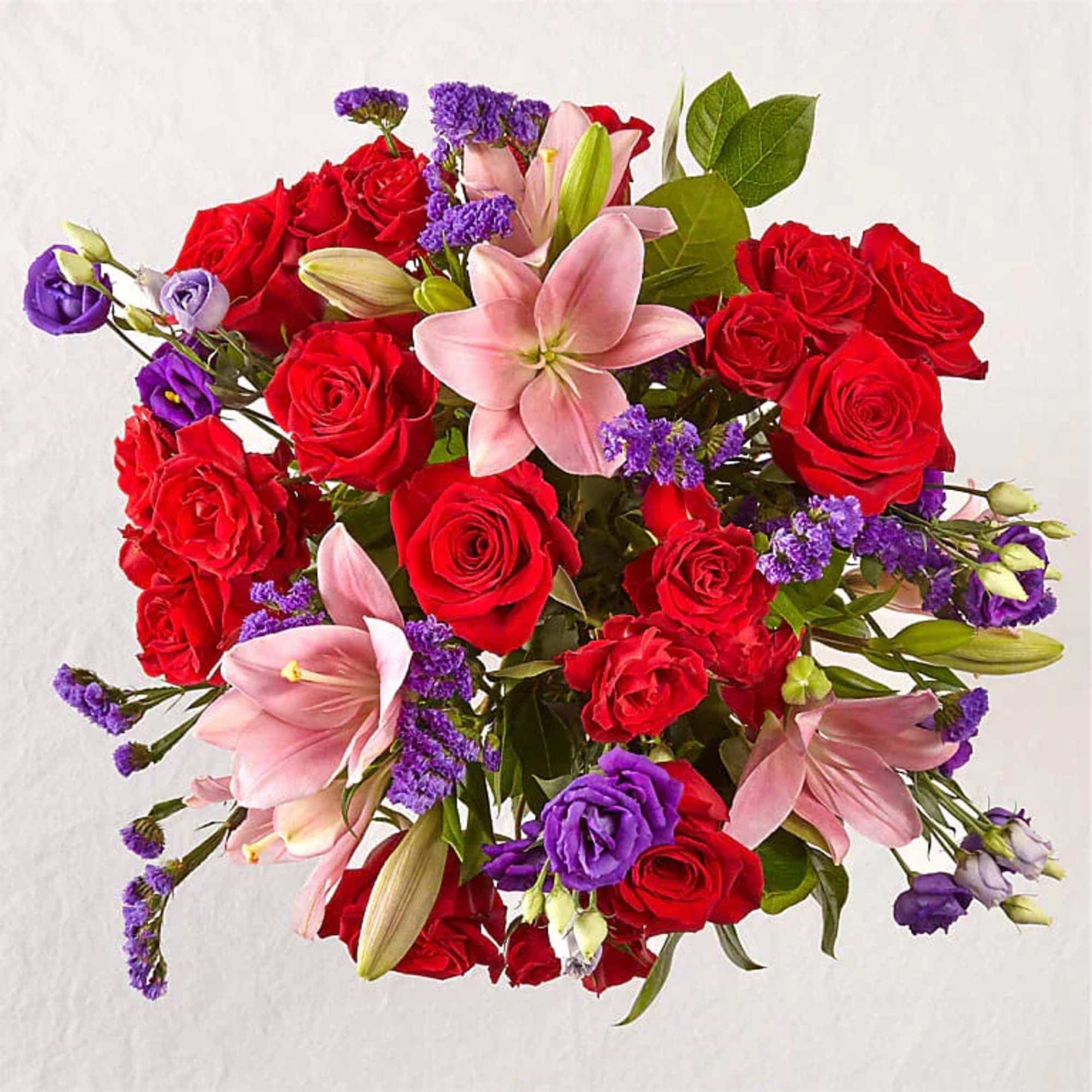 This dreamy jewel toned bouquet combines bold color and eye catching texture