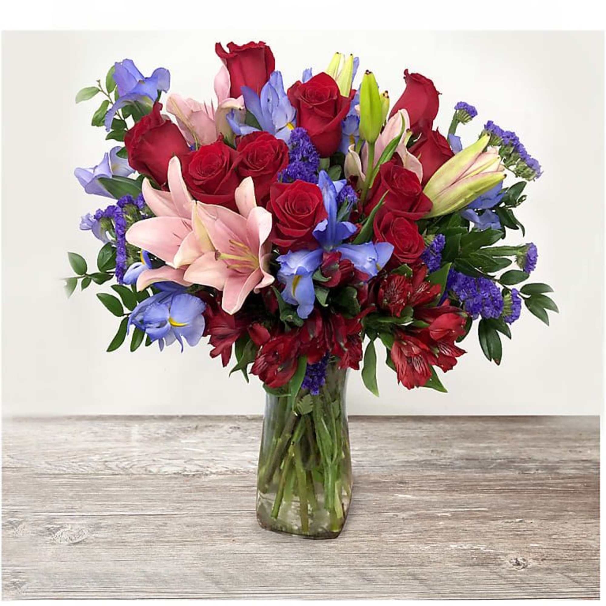 This dreamy jewel toned bouquet combines bold color and eye catching texture