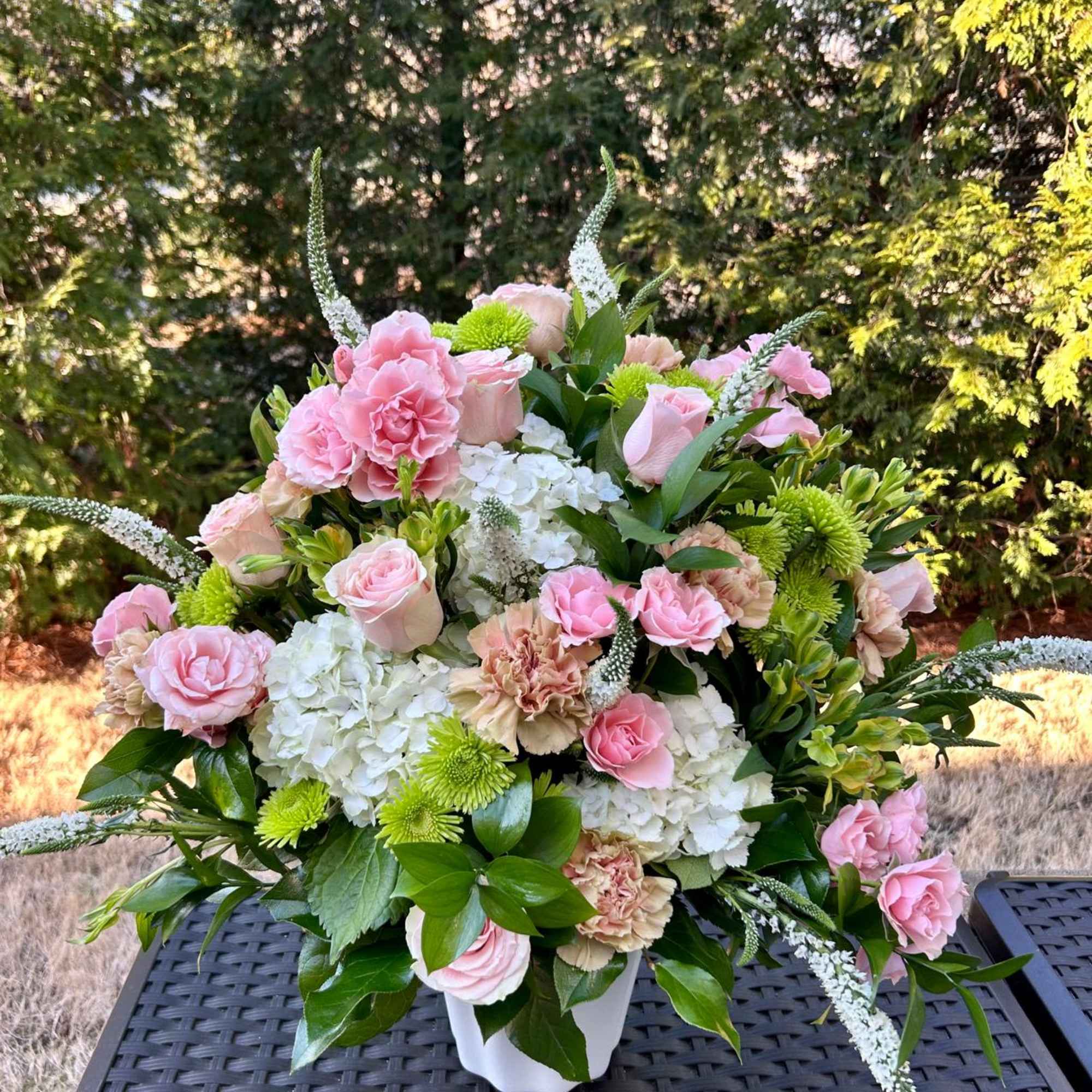 This arrangement is a gentle caress for the eyes and the heart.