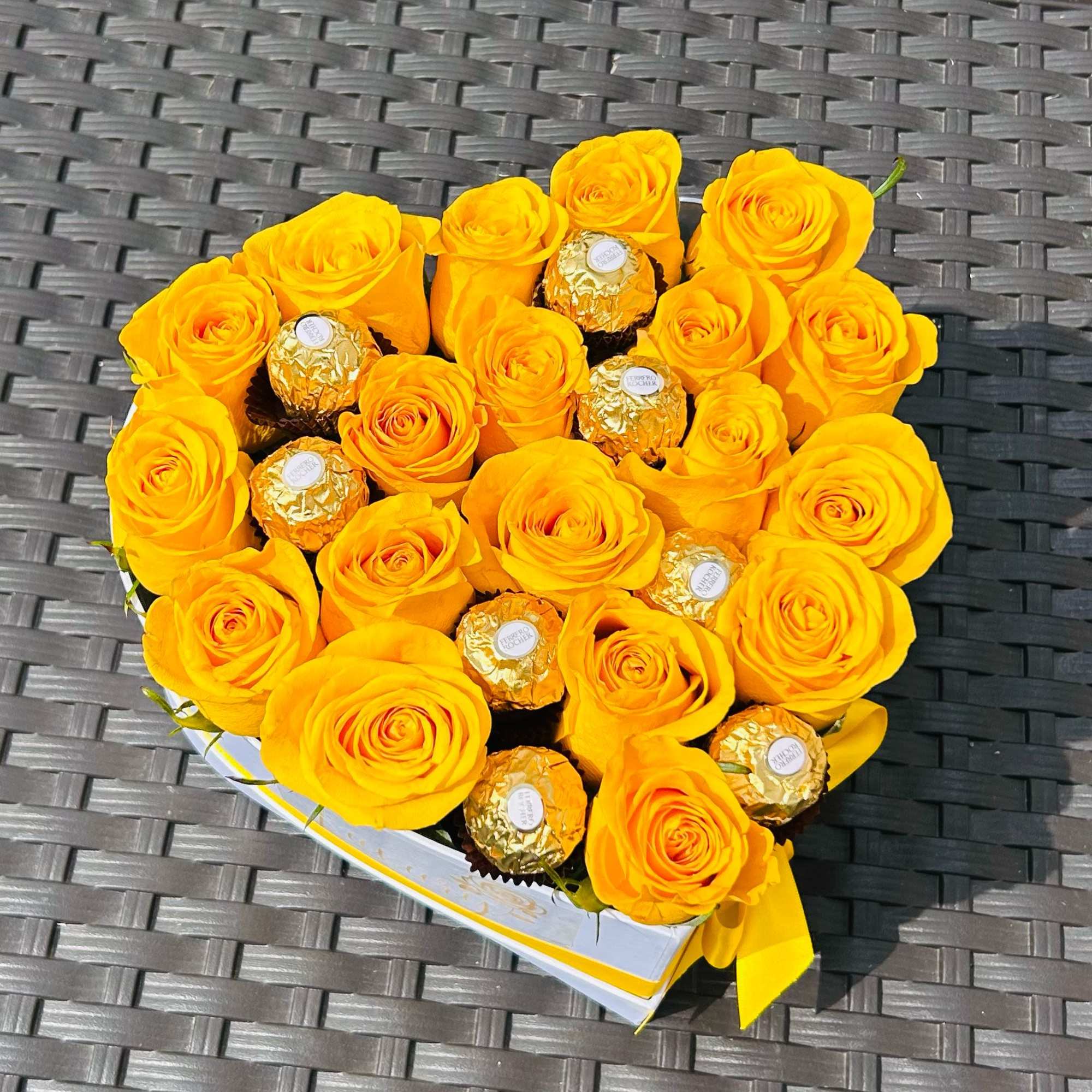 Candy Heart Box is an exclusive design of fresh roses and chocolates
