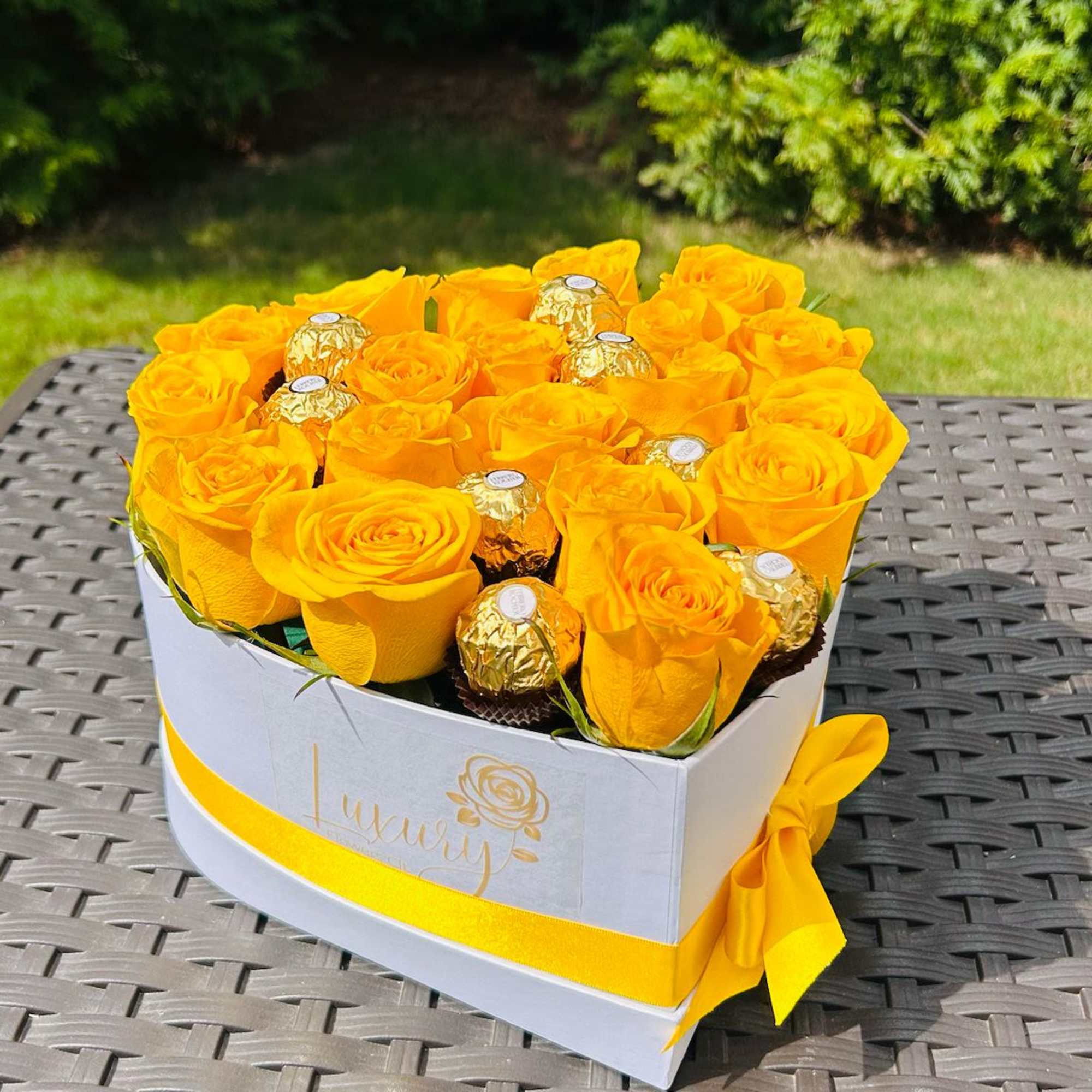 Candy Heart Box is an exclusive design of fresh roses and chocolates