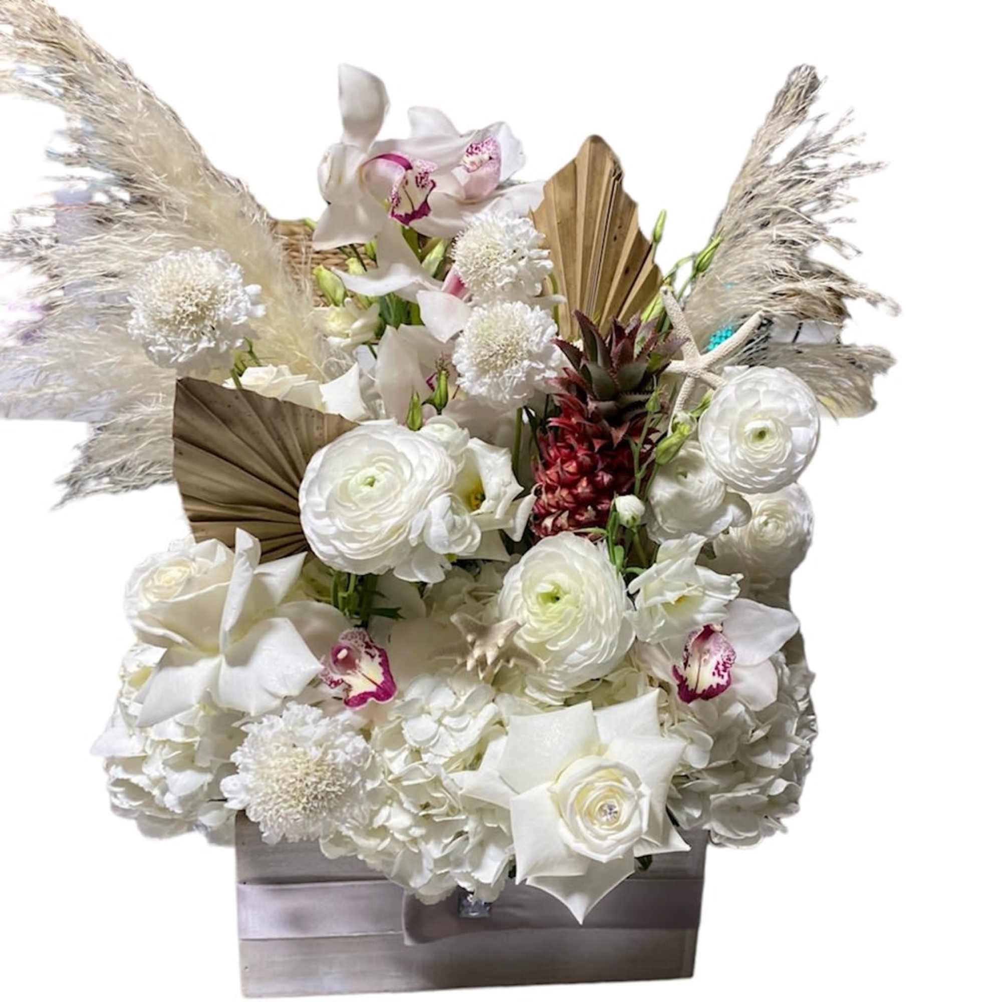 A large white wood box fill with premium blooms with accent of