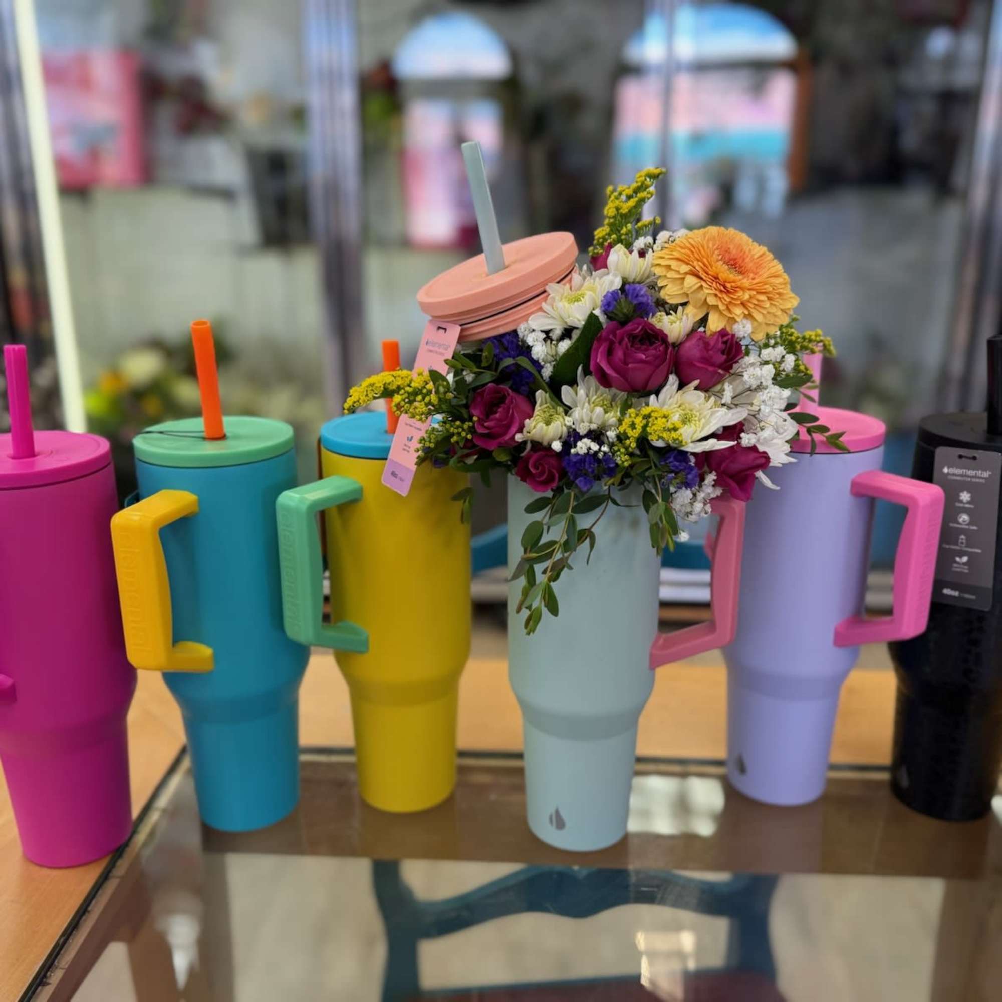 40 oz. tumbler filled with a mix of fresh flowers! Each tumbler