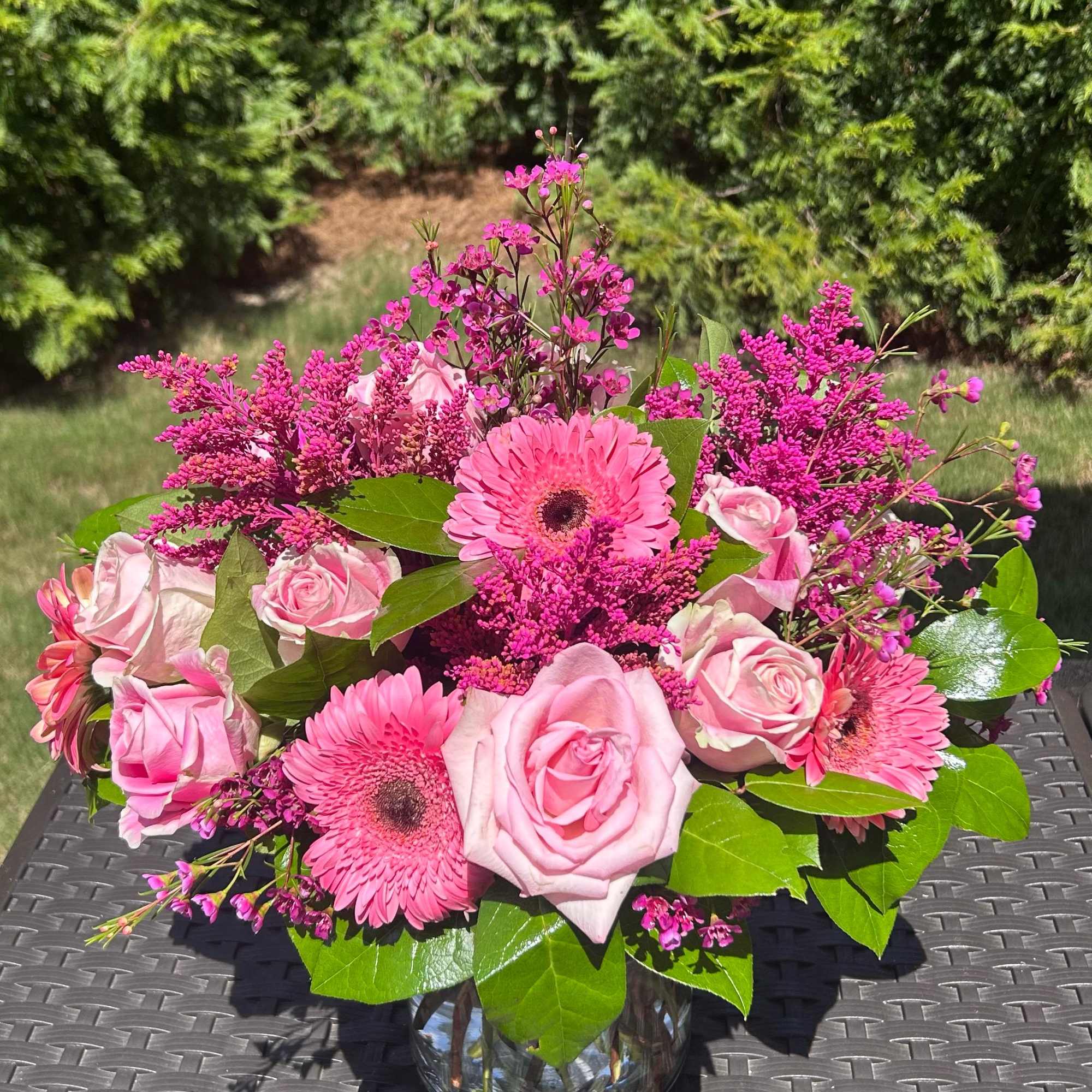 Elegantly crafted with an array of pink and green blooms.
Bloom Details: Gerbera