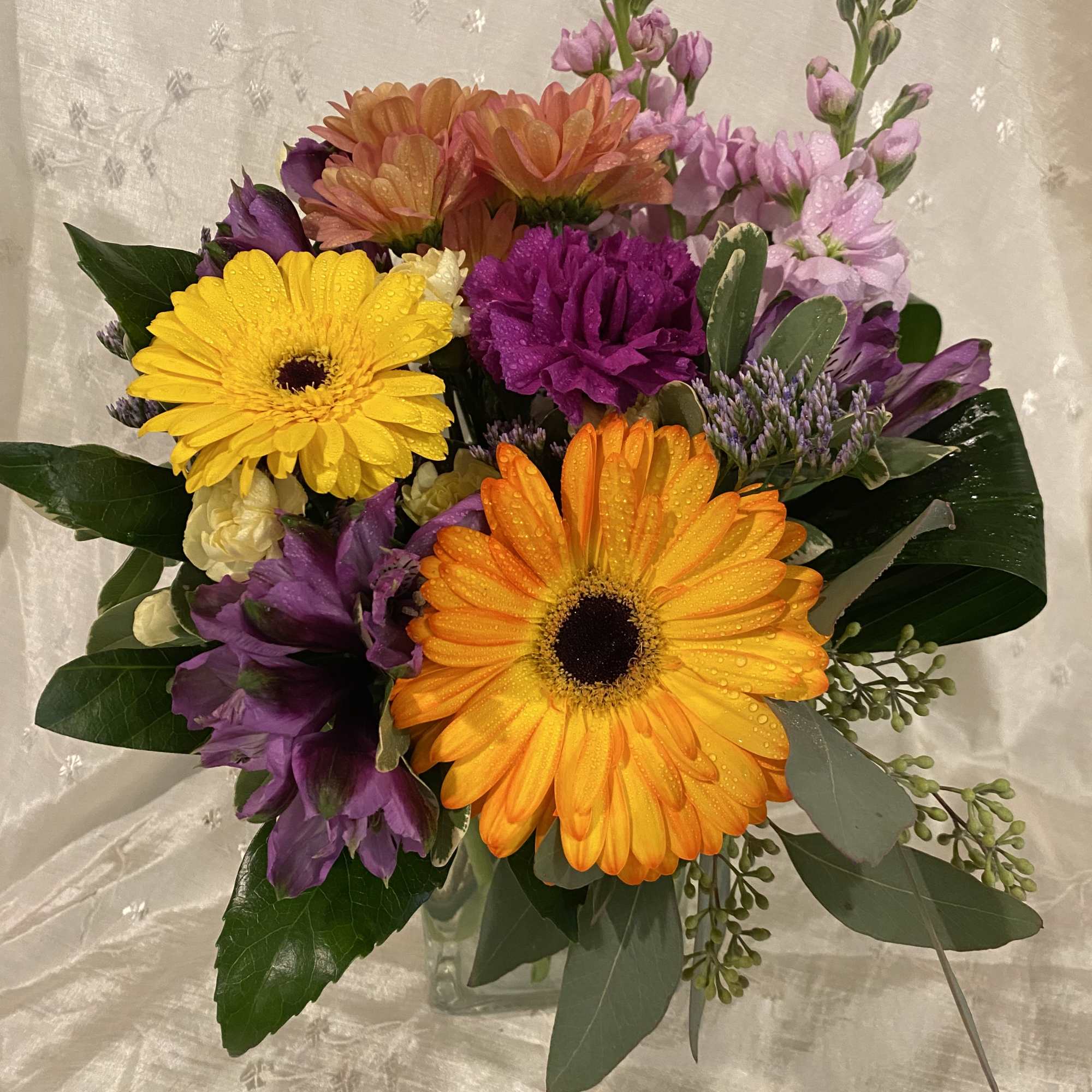 Send this brightly colored arrangement for any occasion!

Please keep in mind each