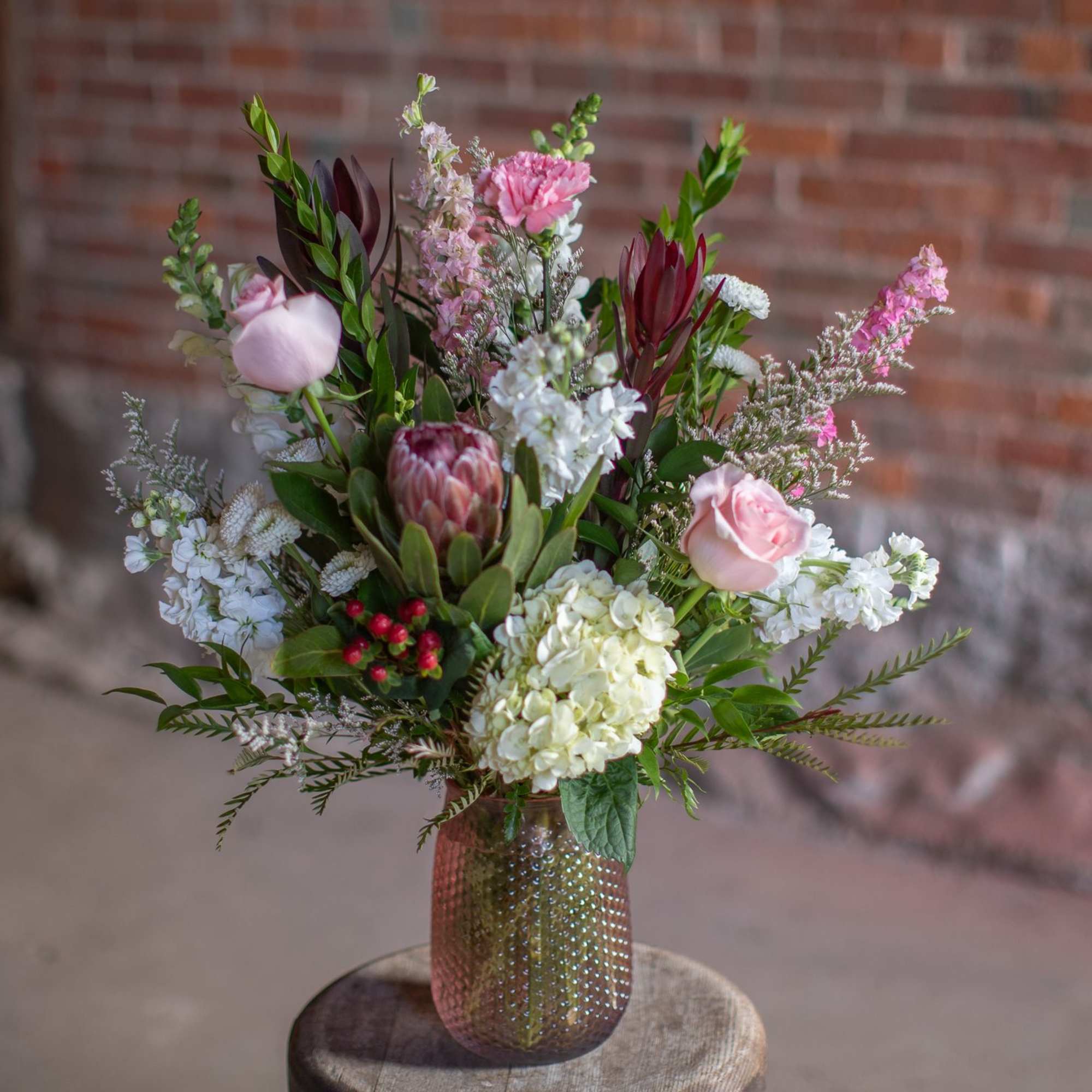 Take home something exotic! Very unique protea flowers are just that, tropical