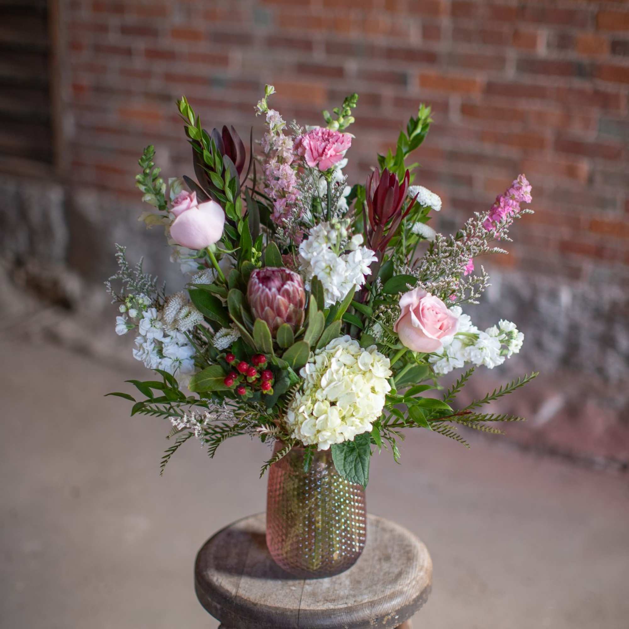 Take home something exotic! Very unique protea flowers are just that, tropical